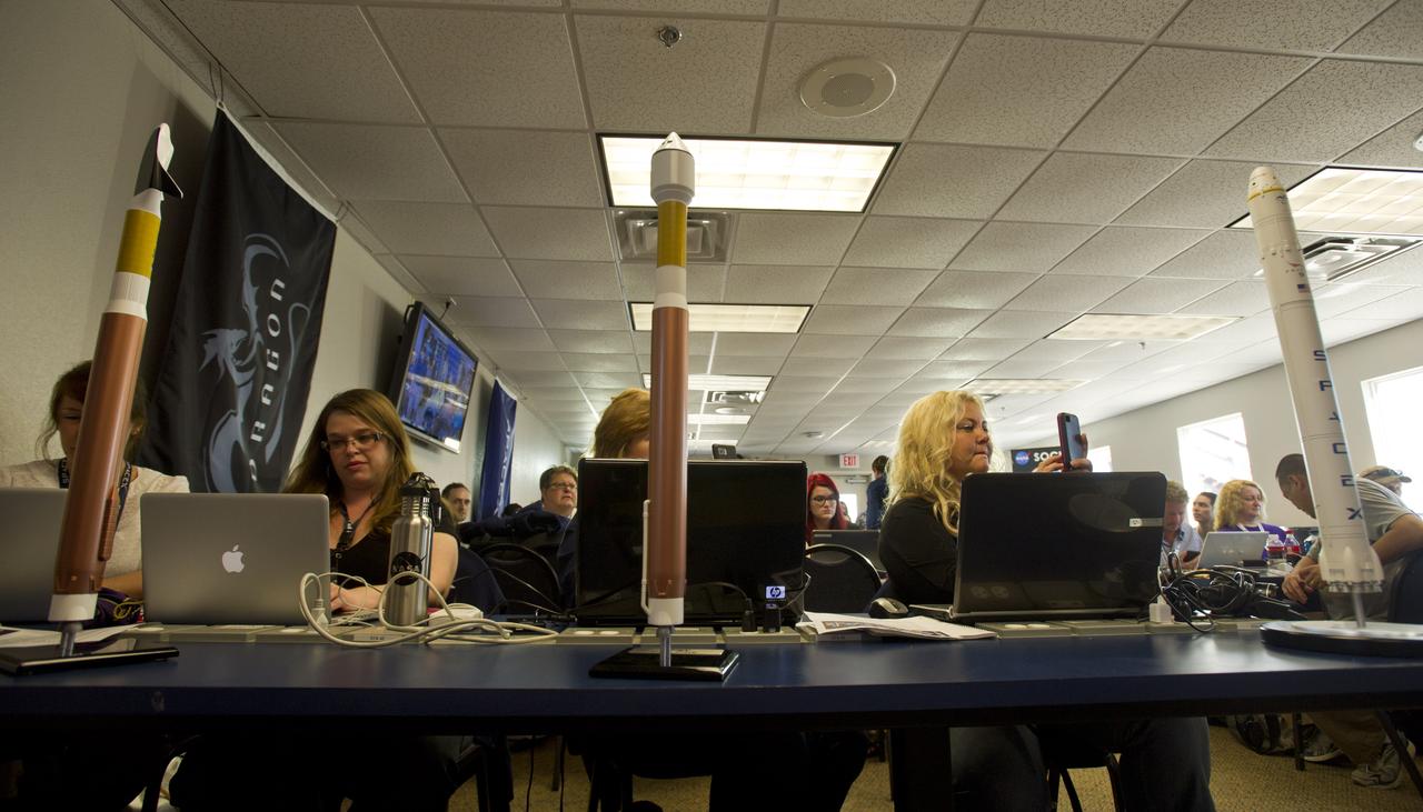 Models of various rockets line a table at a NASA Social, Friday, May 18, 2012, at Kennedy Space Center in Cape Canaveral, Fla. About 50 NASA Social followers attended an event as part of activities surrounding the launch of Space Exploration Technologies, or SpaceX, demonstration mission of the company's Falcon 9 rocket to the International Space Station. Photo Credit: (NASA/Paul E. Alers)