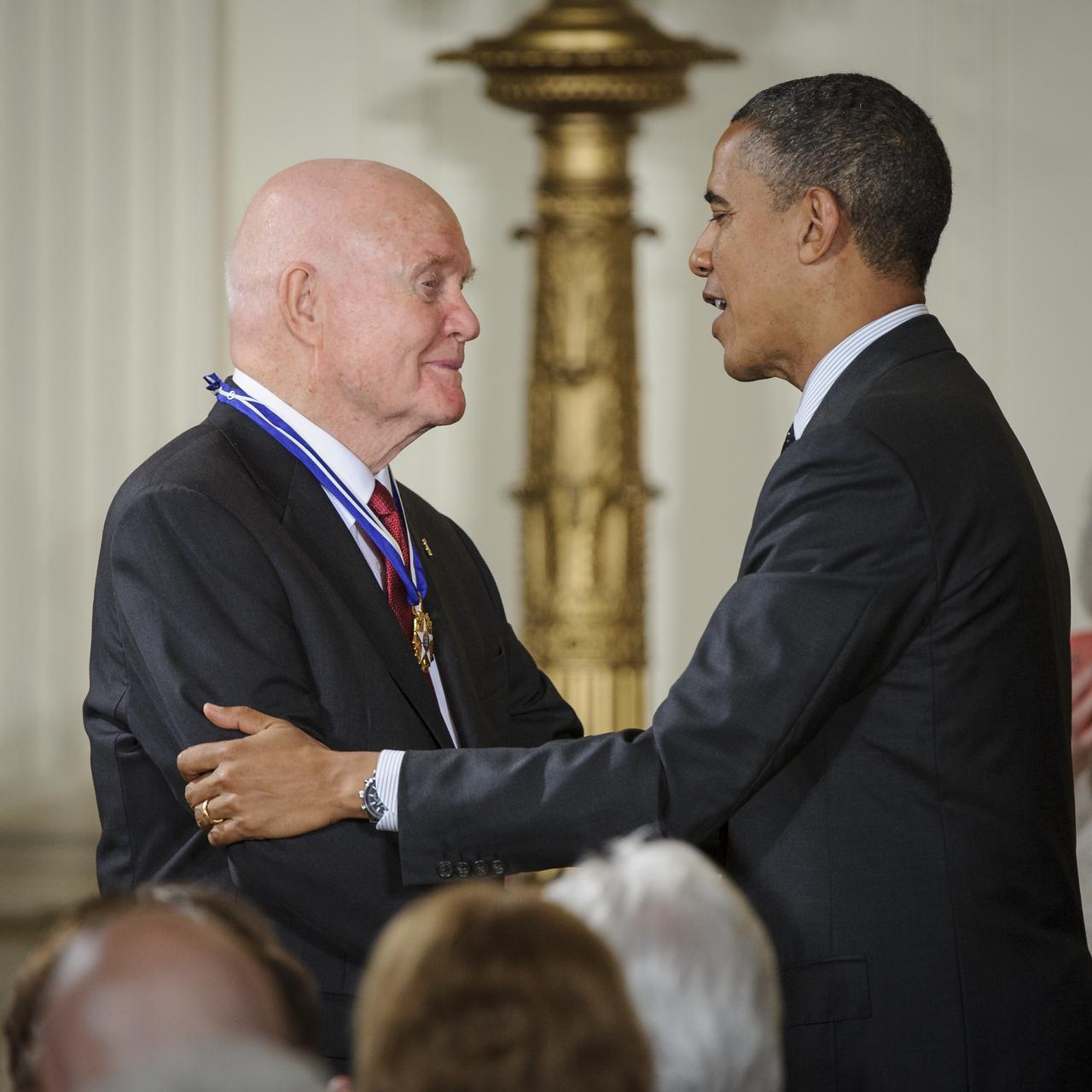 President Barack Obama congratulates former United States Marine Corps pilot, astronaut, and United States Senator John Glenn after presenting him with a Medal of Freedom, Tuesday, May 29, 2012, during a ceremony at the White House in Washington. Photo Credit: (NASA/Bill Ingalls)