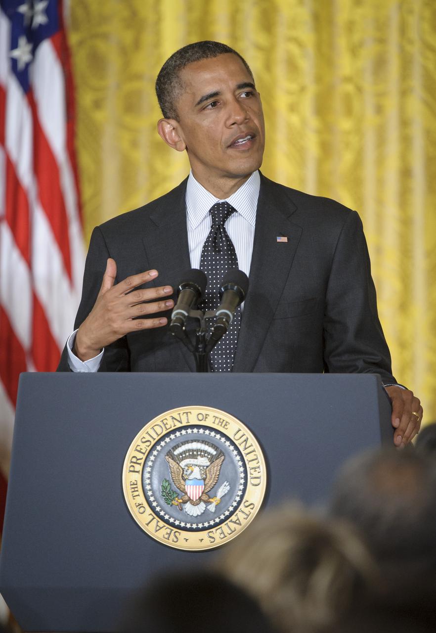 President Barack Obama talks to attendees during the Presidential Medal of Freedom ceremony, held on Tuesday, May 29, 2012, at the White House in Washington. One of the awardees was former United States Marine Corps pilot, astronaut, and United States Senator John Glenn.  Photo Credit: (NASA/Bill Ingalls)