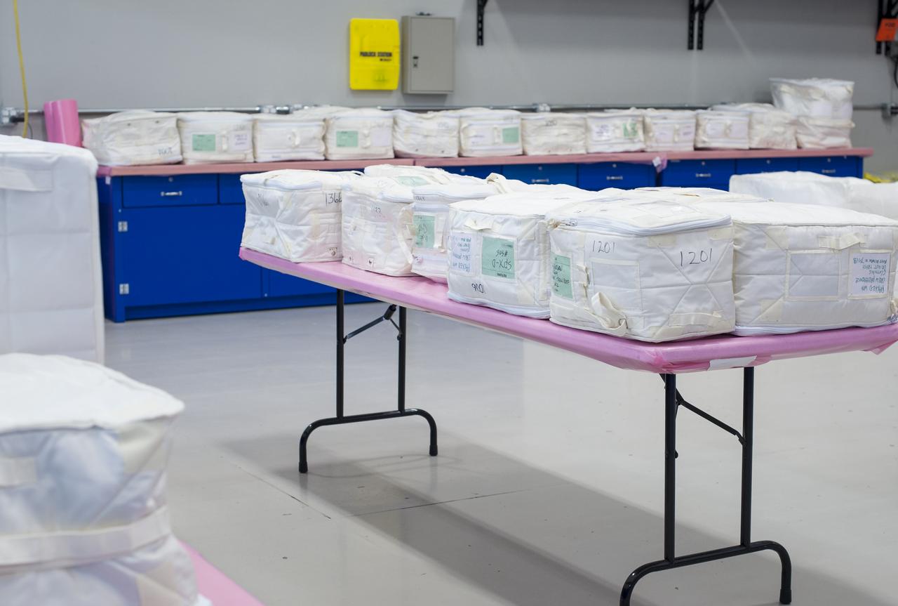 Some of the 1,367 pounds of cargo the SpaceX Dragon spacecraft returned to Earth from the space station are seen in a clean room at the SpaceX rocket development facility, Wednesday, June 13, 2012 in McGregor, Texas.  NASA Administrator Charles Bolden and SpaceX CEO and Chief Designer Elon Musk were at the facility to view the historic Dragon capsule and to thank the more than 150 SpaceX employees working at the McGregor facility for their role in the historic mission. Photo Credit: (NASA/Bill Ingalls)