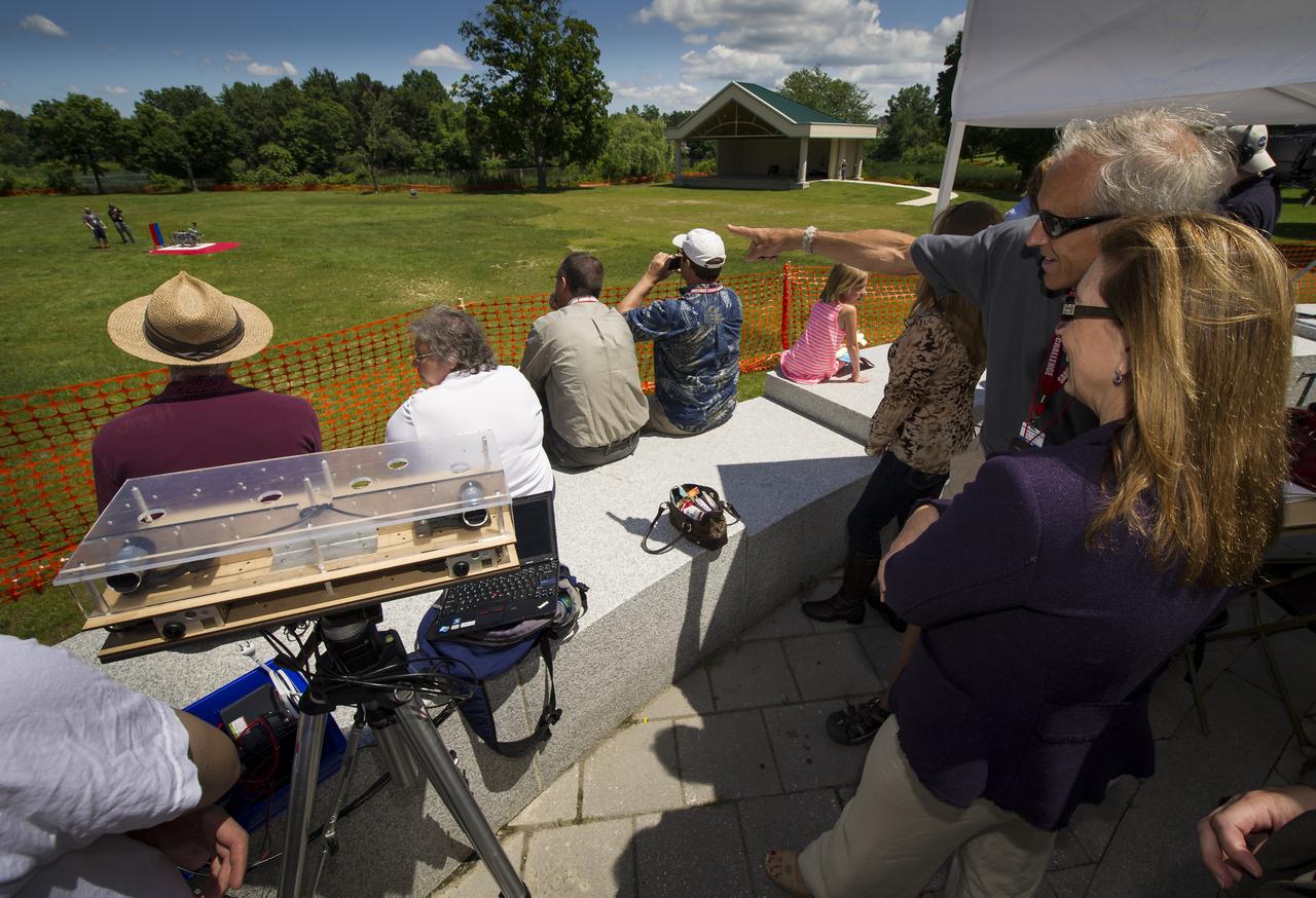 NASA Deputy Administrator Lori Garver, right, listens as Worcester Polytechnic Institute (WPI) Robotics Resource Center Director and NASA-WPI Sample Return Robot Centennial Challenge Judge Ken Stafford points out how the robots navigate the playing field during the challenge on Saturday, June 16, 2012 in Worcester, Mass. Teams were challenged to build autonomous robots that can identify, collect and return samples.  NASA needs autonomous robotic capability for future planetary exploration. Photo Credit: (NASA/Bill Ingalls)