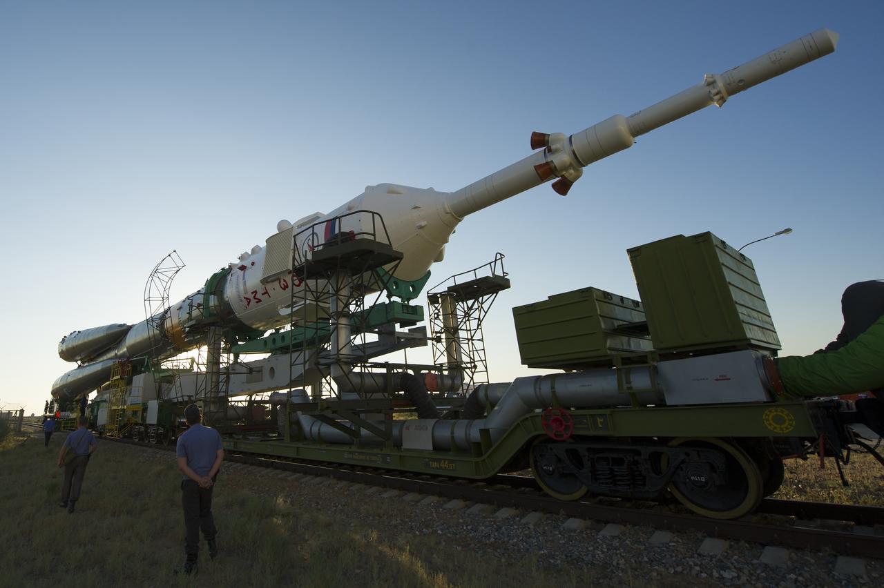 The Soyuz TMA-05M spacecraft is rolled out by train on its way to the launch pad at the Baikonur Cosmodrome in Kazakhstan, Thursday, July 12, 2012. The launch of the Soyuz spacecraft with Expedition 32 Soyuz Commander Yuri Malenchenko, NASA Flight Engineer Sunita Williams and JAXA (Japan Aerospace Exploration Agency) Flight Engineer Akihiko Hoshide is scheduled for the morning of Sunday, July 15, local time. Photo Credit (NASA/Carla Cioffi)