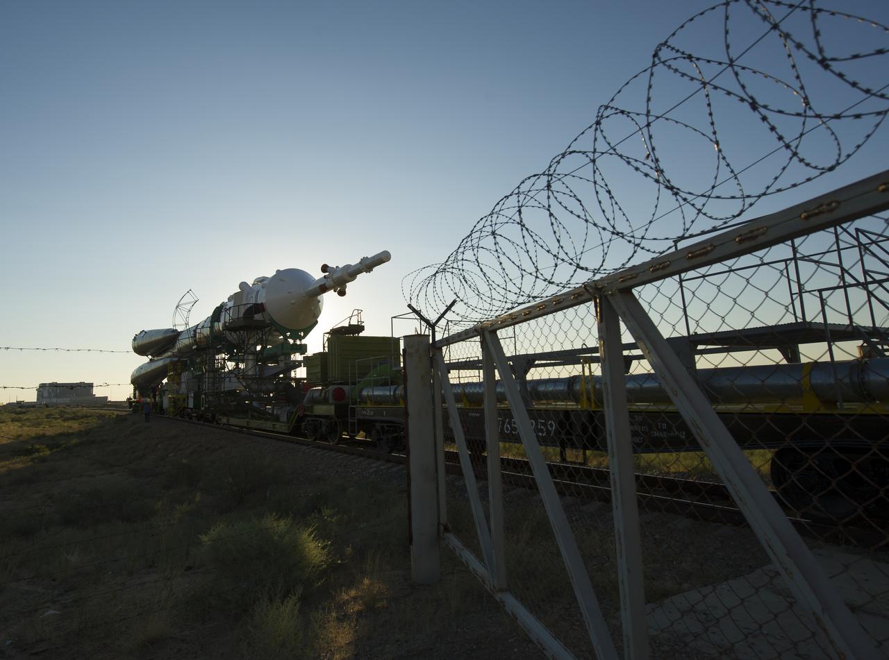 The Soyuz TMA-05M spacecraft is rolled out by train on its way to the launch pad at the Baikonur Cosmodrome in Kazakhstan, Thursday, July 12, 2012. The launch of the Soyuz spacecraft with Expedition 32 Soyuz Commander Yuri Malenchenko, NASA Flight Engineer Sunita Williams and JAXA (Japan Aerospace Exploration Agency) Flight Engineer Akihiko Hoshide is scheduled for the morning of Sunday, July 15, local time. Photo Credit (NASA/Carla Cioffi)