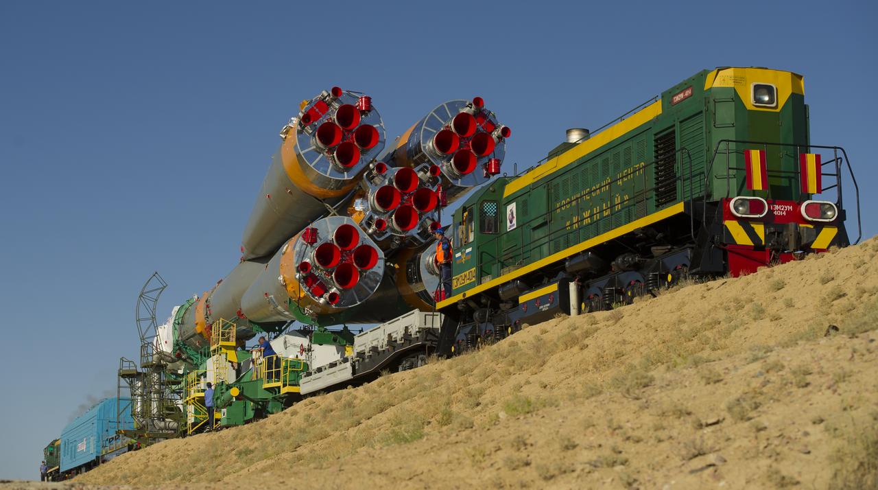 The Soyuz TMA-05M spacecraft is rolled out by train on its way to the launch pad at the Baikonur Cosmodrome in Kazakhstan, Thursday, July 12, 2012. The launch of the Soyuz spacecraft with Expedition 32 Soyuz Commander Yuri Malenchenko, NASA Flight Engineer Sunita Williams and JAXA (Japan Aerospace Exploration Agency) Flight Engineer Akihiko Hoshide is scheduled for the morning of Sunday, July 15, local time. Photo Credit (NASA/Carla Cioffi)