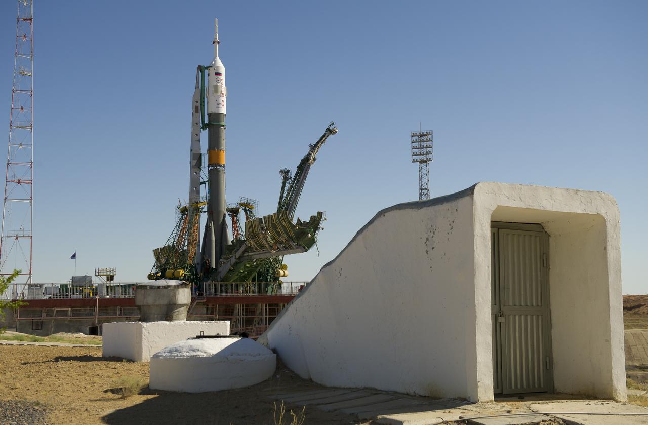 The Soyuz TMA-05M spacecraft is positioned near a bunker at the launch pad following its rollout, Thursday, July 12, 2012 at the Baikonur Cosmodrome in Kazakhstan. The launch of the Soyuz rocket is scheduled for the morning of July 15 local time. Photo Credit: (NASA/Carla Cioffi)