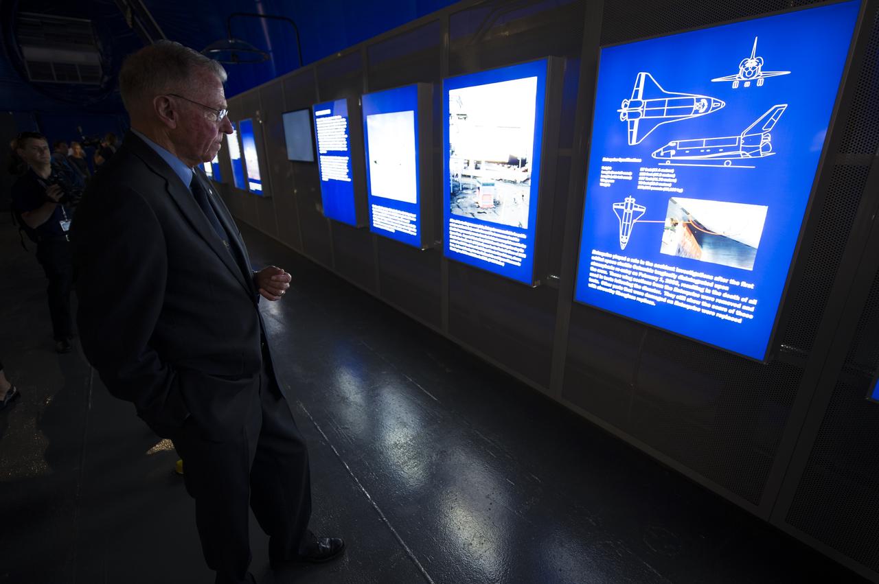 Former NASA Astronaut and Enterprise Commander Joe Engle looks at an exhibit in the Intrepid Sea, Air & Space Museum's Space Shuttle Pavilion where the space shuttle Enterprise is on Thursday, July 19, 2012 in New York. Photo Credit: (NASA/Bill Ingalls)