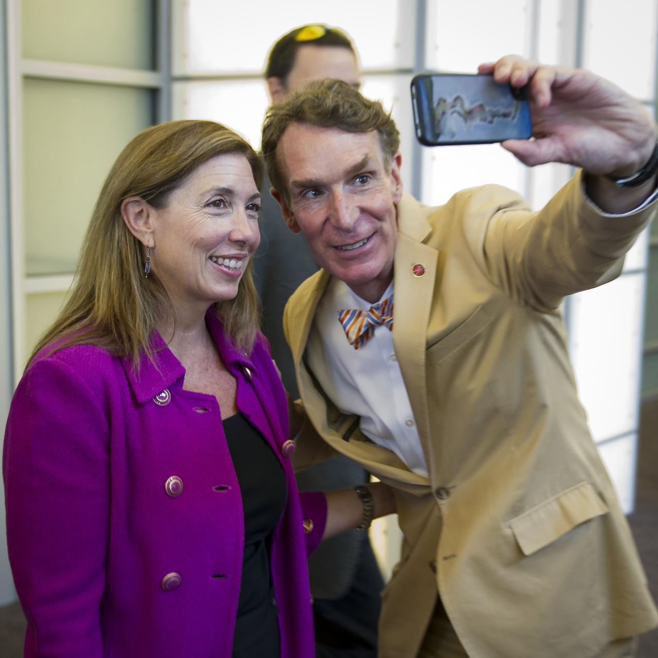 Bill Nye, known as the Science Guy, takes a photograph of himself with NASA Deputy Administrator Lori Garver at the Planetary Society's 2012 Planetfest on Saturday, Aug. 4, 2012 in Pasadena, Calif.  Photo Credit: (NASA/Bill Ingalls)