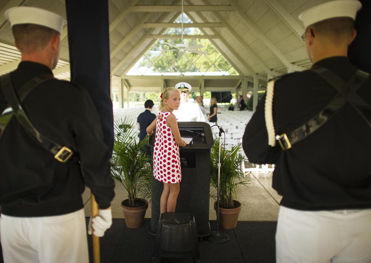 Piper Van Wagenen, one of Neil Armstrong's 10 grandchildren, is seen during preparation of a memorial service celebrating the life of Neil Armstrong, Friday, Aug. 31, 2012, at the Camargo Club in Cincinnati. Armstrong, the first man to walk on the moon during the 1969 Apollo 11 mission, died Saturday, Aug. 25. He was 82. Photo Credit: (NASA/Bill Ingalls)