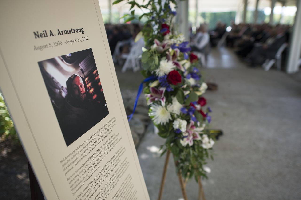 A memorial tribute from the Smithsonian is seen at the entrance of a private memorial service celebrating the life of Neil Armstrong, Aug. 31, 2012, at the Camargo Club in Cincinnati. Armstrong, the first man to walk on the moon during the 1969 Apollo 11 mission, died Saturday, Aug. 25. He was 82. Photo Credit: (NASA/Bill Ingalls)