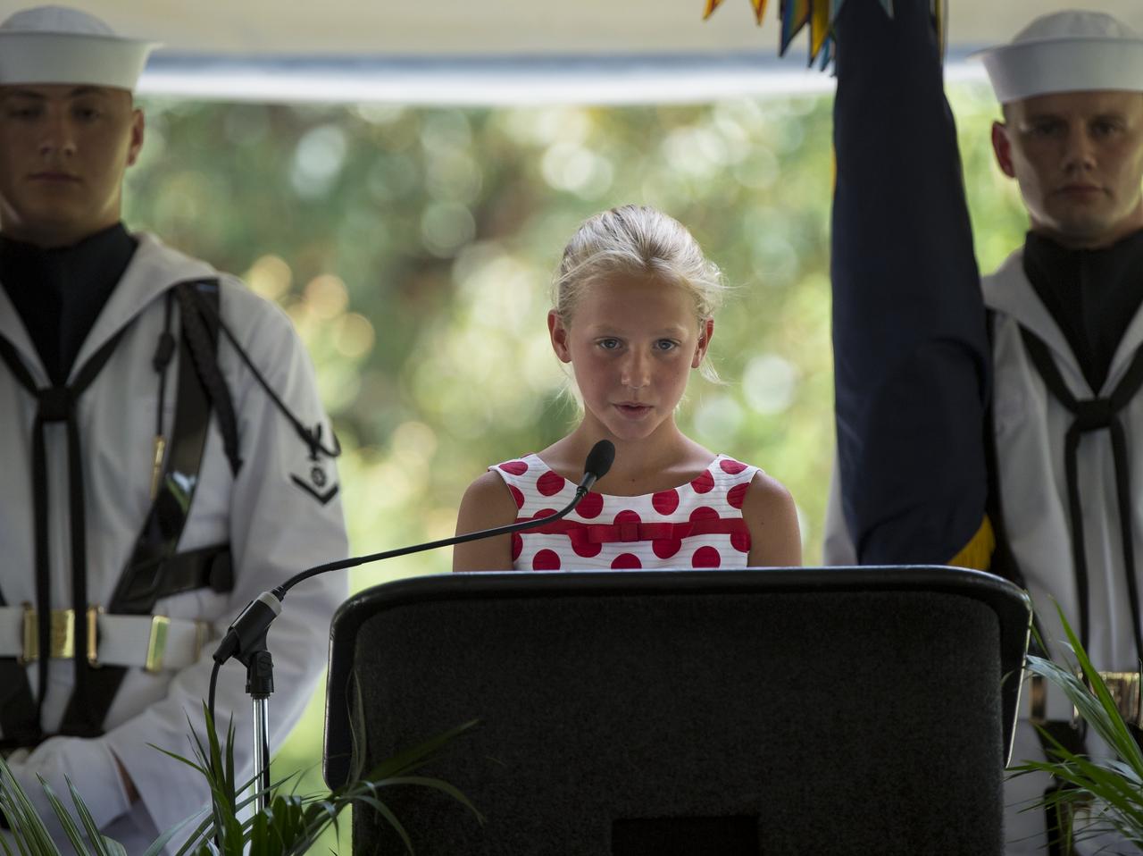 Piper Van Wagenen, one of Neil Armstrong's 10 grandchildren, speaks during a memorial service celebrating the life of her grandfather, Friday, Aug. 31, 2012, at the Camargo Club in Cincinnati. Armstrong, the first man to walk on the moon during the 1969 Apollo 11 mission, died Saturday, Aug. 25. He was 82. Photo Credit: (NASA/Bill Ingalls)