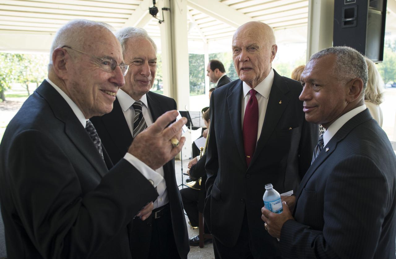 Apollo 13 Astronaut Jim Lovell, left, former NASA Administrator Dan Goldin, Sen. John Glenn, third from left, and NASA Administrator Charles Bolden, right, talk at a private memorial service celebrating the life of Neil Armstrong, Aug. 31, 2012, at the Camargo Club in Cincinnati. Armstrong, the first man to walk on the moon during the 1969 Apollo 11 mission, died Saturday, Aug. 25. He was 82. Photo Credit: (NASA/Bill Ingalls)