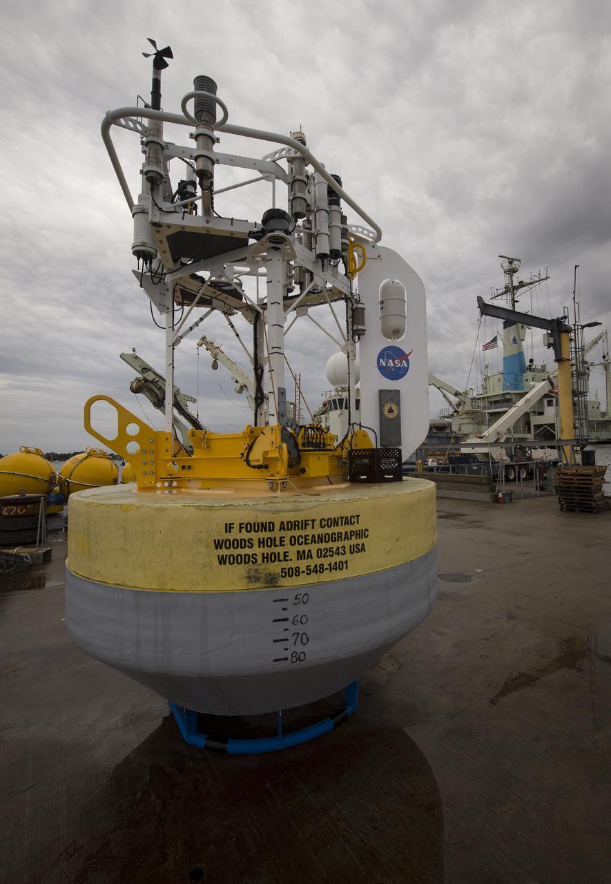 A sensor-laden buoy is seen prior to being loaded onboard the Woods Hole Oceanographic Institution's vessel Knorr on Tuesday, Sept. 4, 2012, in Woods Hole, Mass. The buoy will be deployed in the Atlantic Ocean as part of the Salinity Processes in the Upper Ocean Regional Study (SPURS) which is set to sail on Sept. 6. The NASA-sponsored expedition will sail to the North Atlantic's saltiest spot to get a detailed, 3-D picture of how salt content fluctuates in the ocean's upper layers and how these variations are related to shifts in rainfall patterns around the planet. Photo Credit: (NASA/Bill Ingalls)