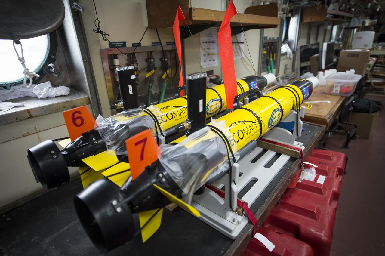 Two EcoMapper AUVs (autonomous underwater vehicles) are seen onboard the the Woods Hole Oceanographic Institution research vessel Knorr on Tuesday, Sept. 4, 2012, in Woods Hole, Mass. The EcoMappers will be deployed in the Atlantic Ocean as part of the Salinity Processes in the Upper Ocean Regional Study (SPURS) which is set to sail on Sept. 6. The NASA-sponsored expedition will sail to the North Atlantic's saltiest spot to get a detailed, 3-D picture of how salt content fluctuates in the ocean's upper layers and how these variations are related to shifts in rainfall patterns around the planet. Photo Credit: (NASA/Bill Ingalls)
