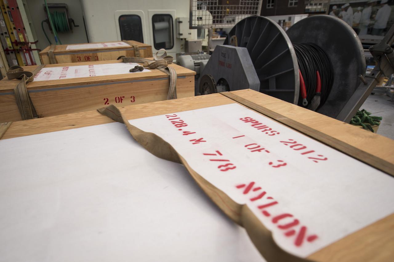 Crates containing scientific instruments are seen on the stern of the Woods Hole Oceanographic Institution's research vessel Knorr on Tuesday, Sept. 4, 2012, in Woods Hole, Mass. Knorr is scheduled to depart on Sept. 6 to take part in the Salinity Processes in the Upper Ocean Regional Study (SPURS). The NASA-sponsored expedition will sail to the North Atlantic's saltiest spot to get a detailed, 3-D picture of how salt content fluctuates in the ocean's upper layers and how these variations are related to shifts in rainfall patterns around the planet. Photo Credit: (NASA/Bill Ingalls)