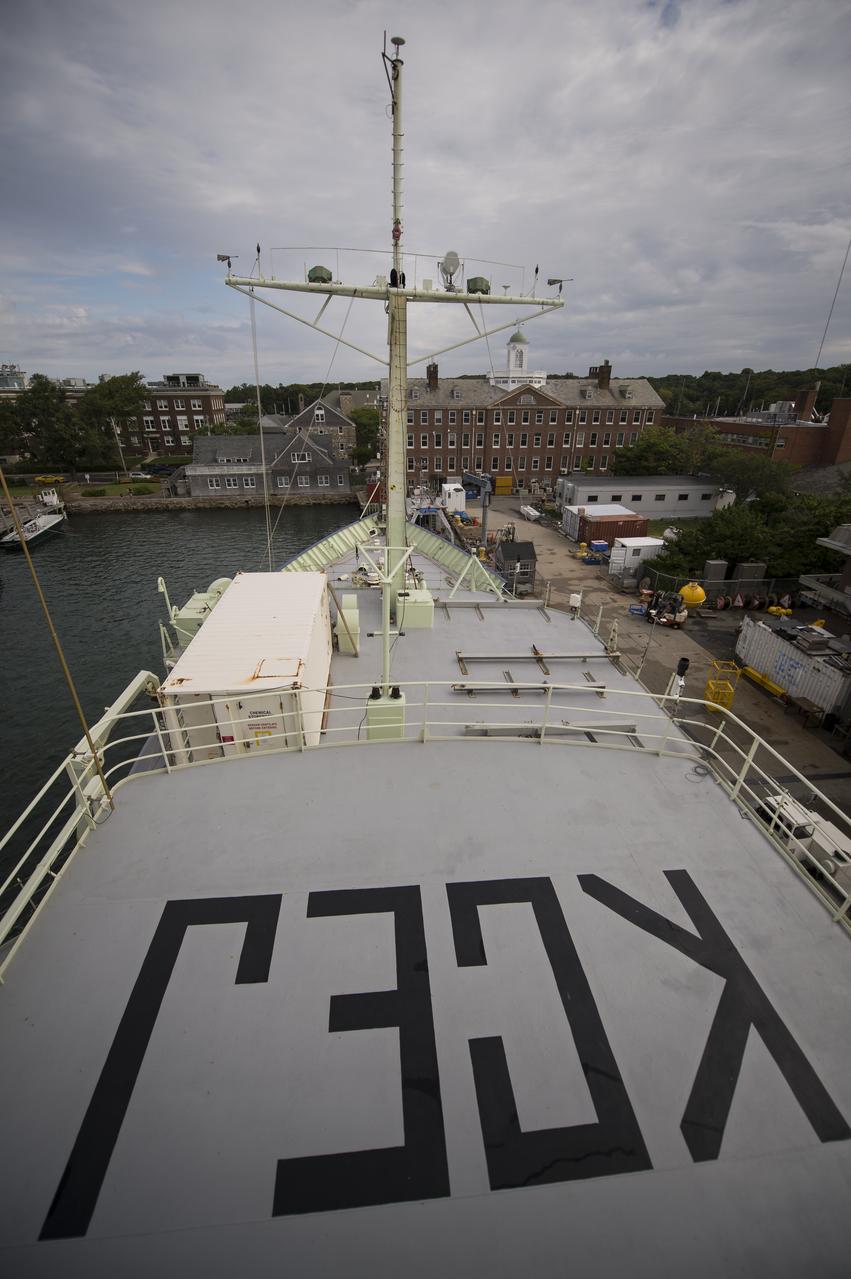The bow of the Woods Hole Oceanographic Institution's research vessel Knorr is seen from the bridge on Tuesday, Sept. 4, 2012, in Woods Hole, Mass. Knorr is scheduled to depart on Sept. 6 to take part in the Salinity Processes in the Upper Ocean Regional Study (SPURS). The NASA-sponsored expedition will sail to the North Atlantic's saltiest spot to get a detailed, 3-D picture of how salt content fluctuates in the ocean's upper layers and how these variations are related to shifts in rainfall patterns around the planet. Photo Credit: (NASA/Bill Ingalls)