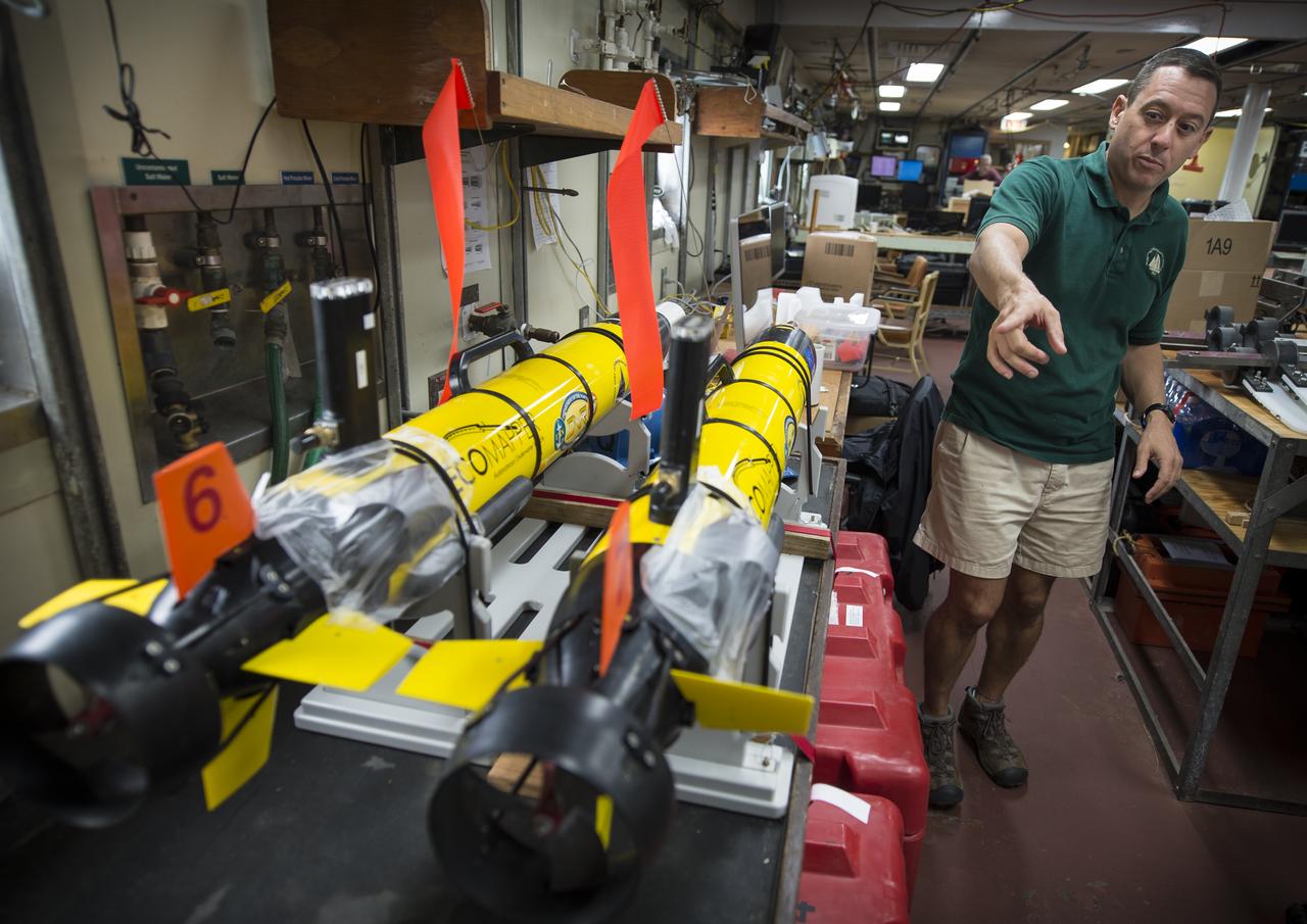Woods Hole Oceanographic Institution Scientist Dave Fratantoni works on the EcoMapper AUVs (autonomous underwater vehicles) onboard the Institute's research vessel Knorr, Tuesday, Sept. 4, 2012, in Woods Hole, Mass. The EcoMappers will be deployed in the Atlantic Ocean as part of the Salinity Processes in the Upper Ocean Regional Study (SPURS) which is set to sail on Sept. 6. The NASA-sponsored expedition will sail to the North Atlantic's saltiest spot to get a detailed, 3-D picture of how salt content fluctuates in the ocean's upper layers and how these variations are related to shifts in rainfall patterns around the planet. Photo Credit: (NASA/Bill Ingalls)