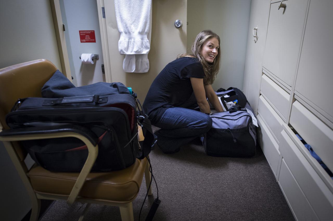 University of Washington Graduate Student Jesse Anderson settles into her cabin onboard the Woods Hole Oceanographic Institution research vessel Knorr on Tuesday, Sept. 4, 2012, in Woods Hole, Mass. Anderson will work with the Argo Floats instruments in the Atlantic Ocean as part of the Salinity Processes in the Upper Ocean Regional Study (SPURS) which is set to sail on Sept. 6. The NASA-sponsored expedition will sail to the North Atlantic's saltiest spot to get a detailed, 3-D picture of how salt content fluctuates in the ocean's upper layers and how these variations are related to shifts in rainfall patterns around the planet. Photo Credit: (NASA/Bill Ingalls)