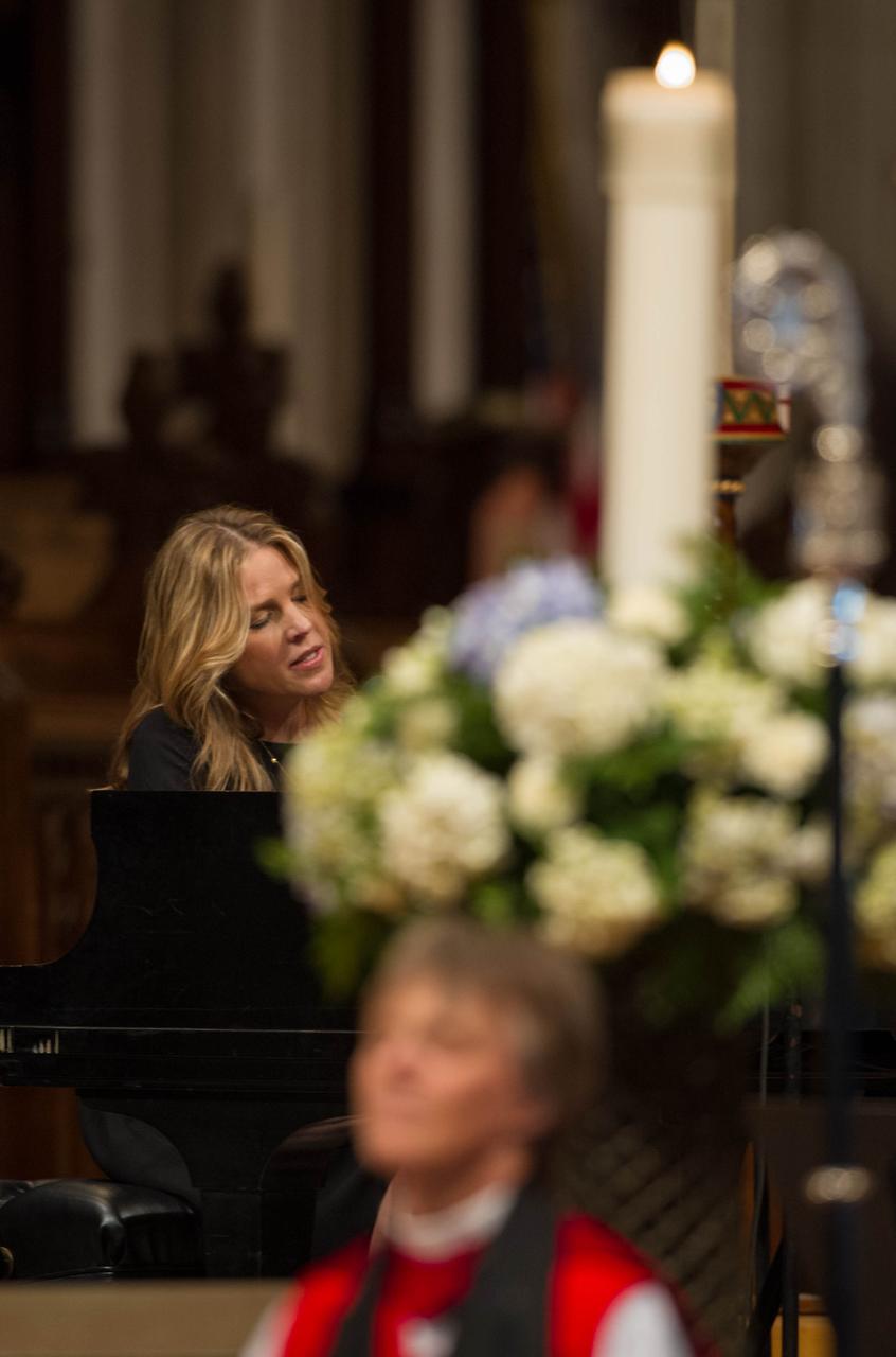 Musician Diana Krall sings ""Fly Me to the Moon" during a memorial service celebrating the life of Neil Armstrong at the Washington National Cathedral, Thursday, Sept. 13, 2012. Armstrong, the first man to walk on the moon during the 1969 Apollo 11 mission, died Saturday, Aug. 25. He was 82. Photo Credit: (NASA/Paul E. Alers)