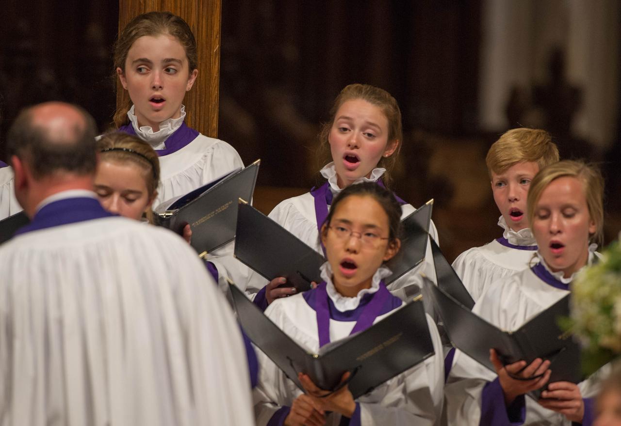 Members of the Cathedral Choirsters sing "For the Beauty of the Earth" during a memorial service celebrating the life of Neil Armstrong at the Washington National Cathedral, Thursday, Sept. 13, 2012. Armstrong, the first man to walk on the moon during the 1969 Apollo 11 mission, died Saturday, Aug. 25. He was 82. Photo Credit:(NASA/Paul E. Alers)