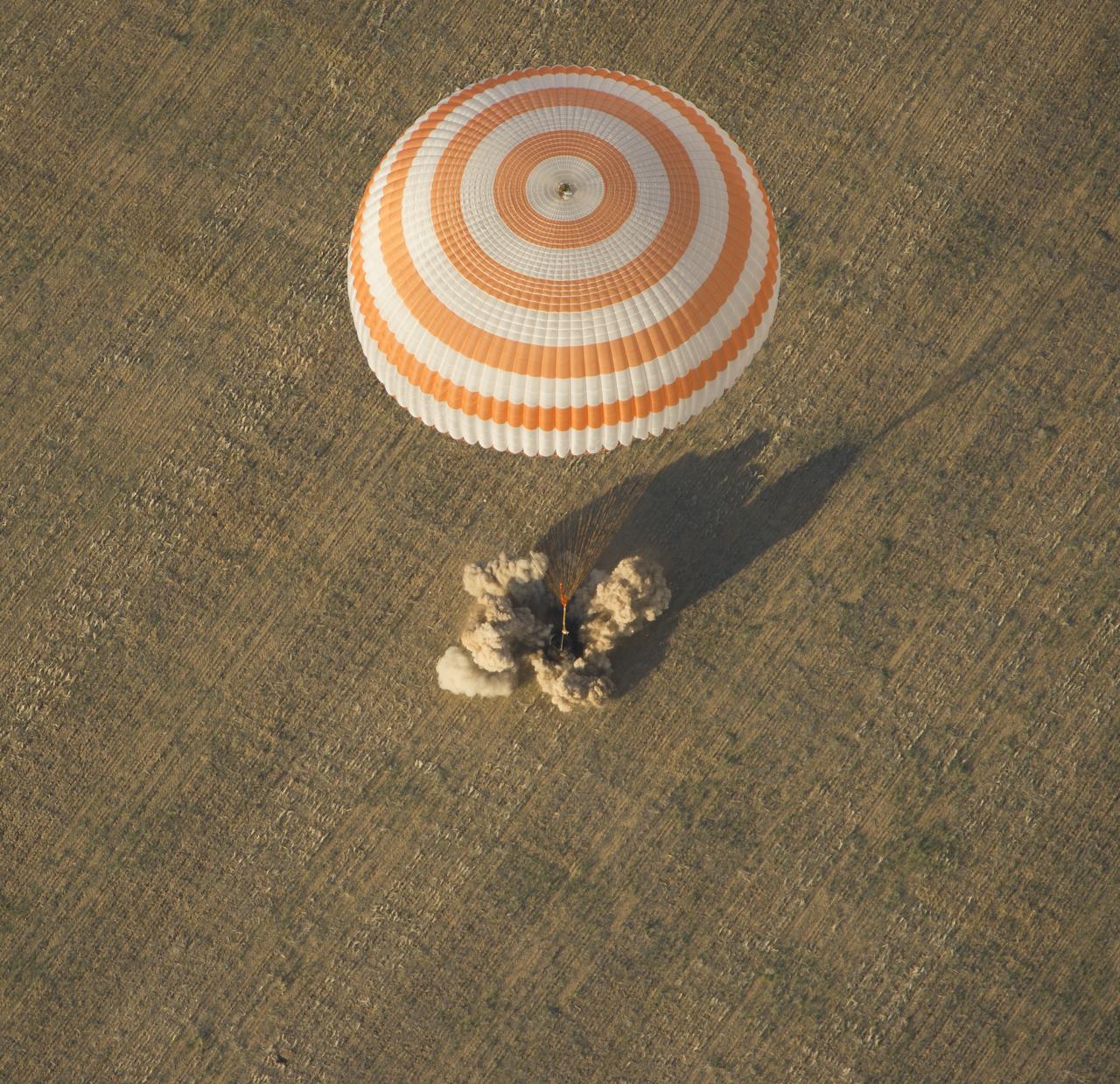 The Soyuz TMA-04M spacecraft is seen as it lands with Expedition 32 Commander Gennady Padalka of Russia, NASA Flight Engineer Joe Acaba and Russian Flight Engineer Sergei Revin in a remote area near the town of Arkalyk, Kazakhstan, on Monday, September 17, 2012.  Padalka, Acaba and Revin returned from five months onboard the International Space Station where they served as members of the Expedition 31 and 32 crews. Photo Credit:  (NASA/Carla Cioffi)
