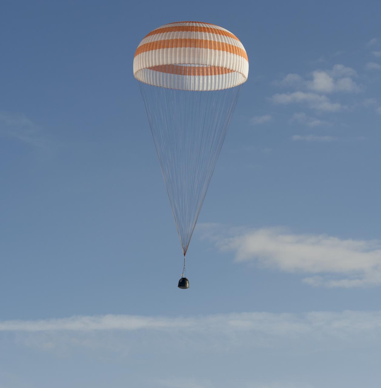 The Soyuz TMA-04M spacecraft is seen as it lands with Expedition 32 Commander Gennady Padalka of Russia, NASA Flight Engineer Joe Acaba and Russian Flight Engineer Sergei Revin in a remote area near the town of Arkalyk, Kazakhstan, on Monday, September 17, 2012.  Padalka, Acaba and Revin returned from five months onboard the International Space Station where they served as members of the Expedition 31 and 32 crews. Photo Credit:  (NASA/Carla Cioffi)