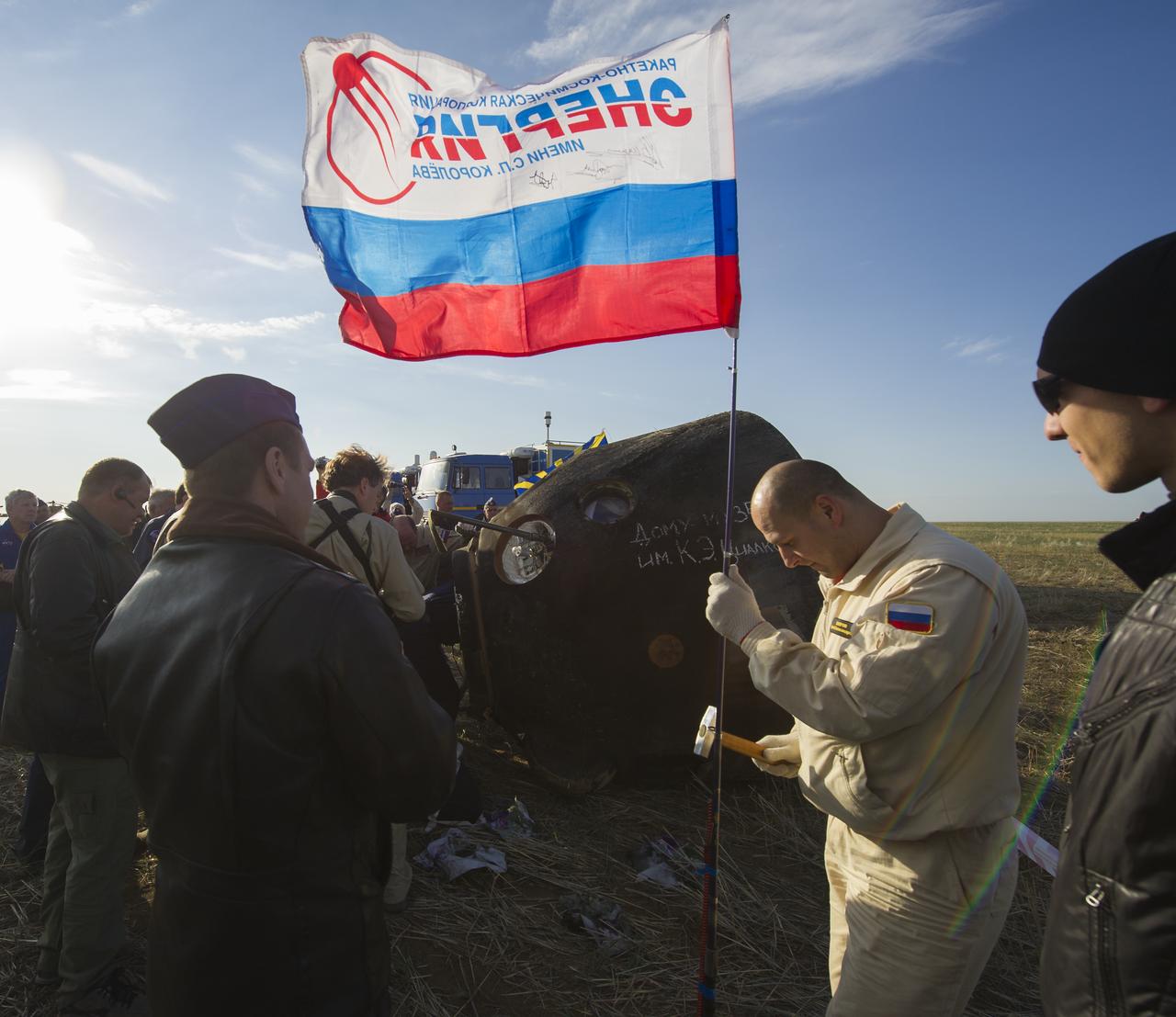 The Soyuz TMA-04M spacecraft is seen following its landing with Expedition 32 Commander Gennady Padalka of Russia, NASA Flight Engineer Joe Acaba and Russian Flight Engineer Sergei Revin in a remote area near the town of Arkalyk, Kazakhstan, on Monday, September 17, 2012.  Padalka, Acaba and Revin returned from five months onboard the International Space Station where they served as members of the Expedition 31 and 32 crews. Photo Credit:  (NASA/Carla Cioffi)