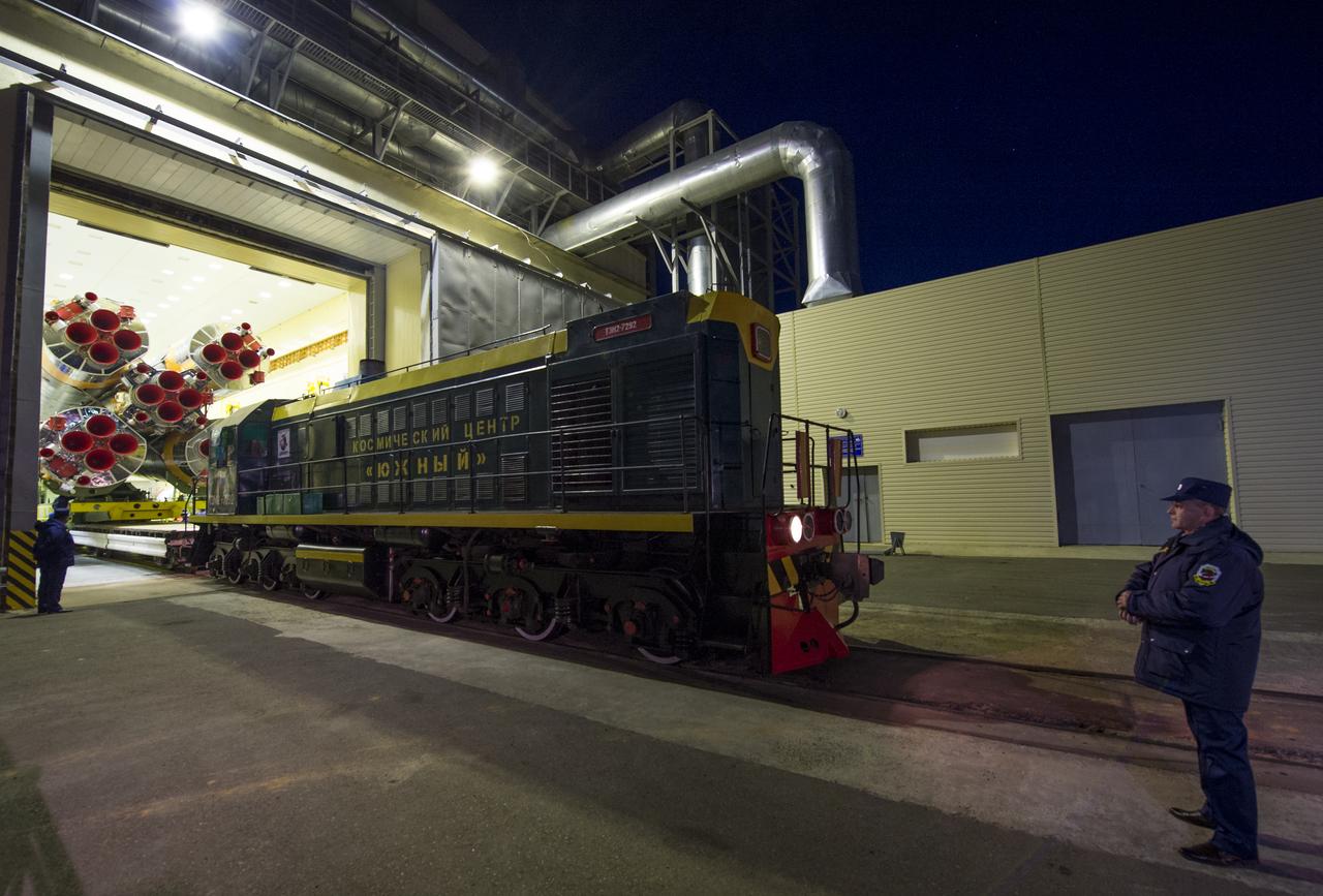 The Soyuz rocket is ready to be rolled out to the launch pad by train, on Sunday, October 21, 2012, at the Baikonur Cosmodrome in Kazakhstan. Launch of the Soyuz rocket is scheduled for October 23 and will send Expedition 33/34 Flight Engineer Kevin Ford of NASA, Soyuz Commander Oleg Novitskiy and Flight Engineer Evgeny Tarelkin of ROSCOSMOS on a five-month mission aboard the International Space Station. Photo Credit: (NASA/Bill Ingalls)