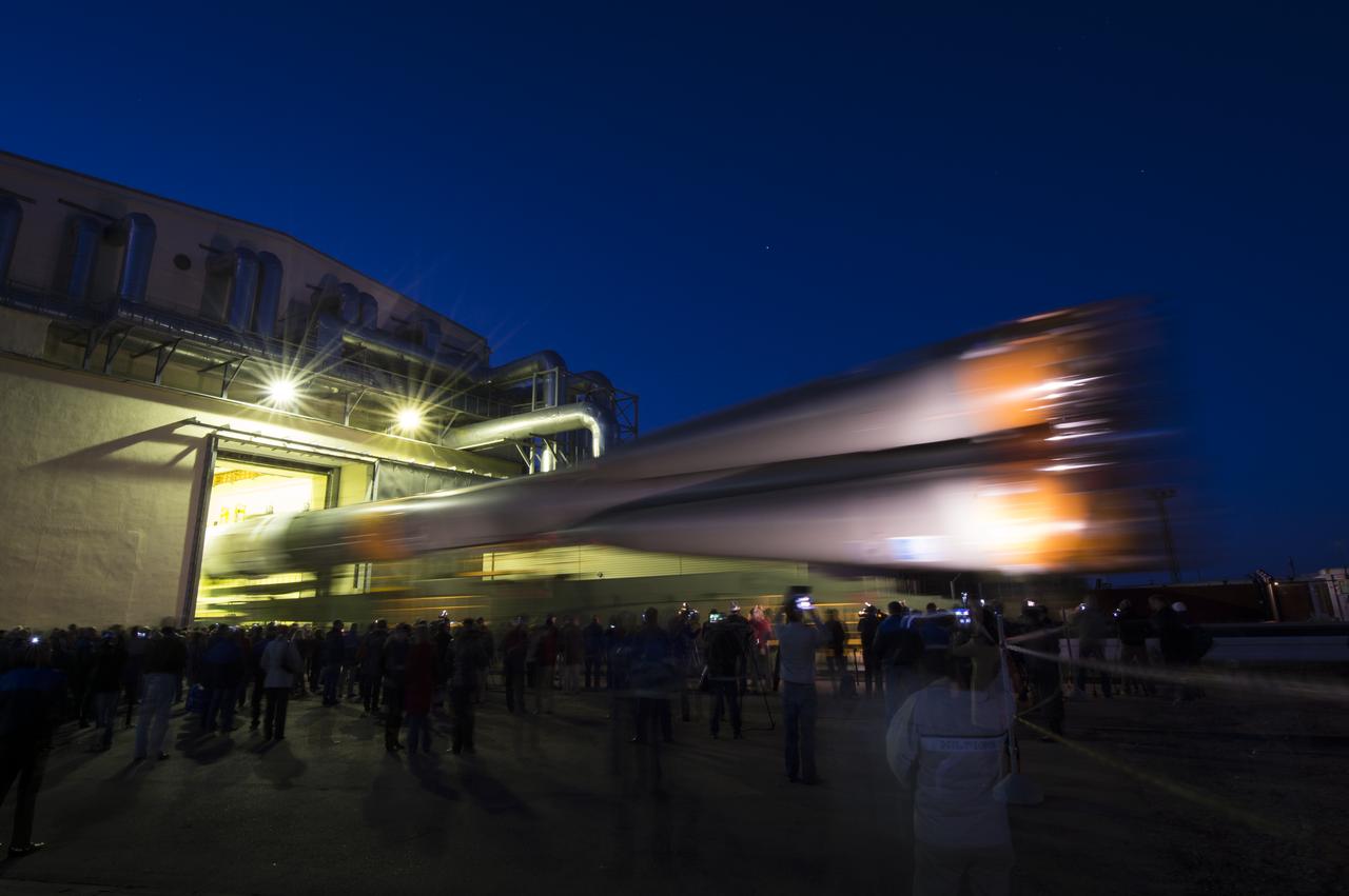 The Soyuz rocket is rolled out to the launch pad by train, on Sunday, October 21, 2012, at the Baikonur Cosmodrome in Kazakhstan. Launch of the Soyuz rocket is scheduled for October 23 and will send Expedition 33/34 Flight Engineer Kevin Ford of NASA, Soyuz Commander Oleg Novitskiy and Flight Engineer Evgeny Tarelkin of ROSCOSMOS on a five-month mission aboard the International Space Station. Photo Credit: (NASA/Bill Ingalls)