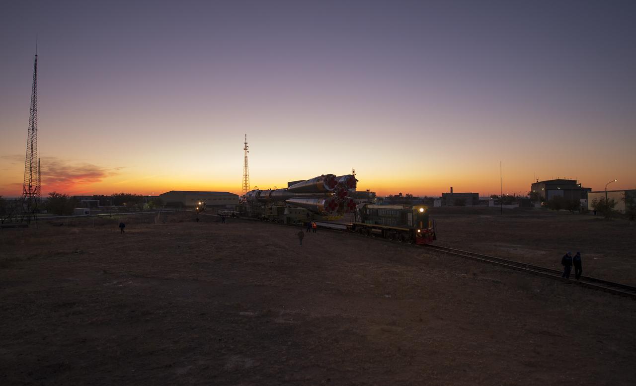 The Soyuz rocket is rolled out to the launch pad by train, on Sunday, October 21, 2012, at the Baikonur Cosmodrome in Kazakhstan. Launch of the Soyuz rocket is scheduled for October 23 and will send Expedition 33/34 Flight Engineer Kevin Ford of NASA, Soyuz Commander Oleg Novitskiy and Flight Engineer Evgeny Tarelkin of ROSCOSMOS on a five-month mission aboard the International Space Station. Photo Credit: (NASA/Bill Ingalls)