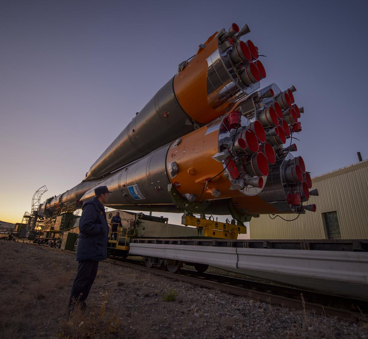 The Soyuz rocket is rolled out to the launch pad by train, on Sunday, October 21, 2012, at the Baikonur Cosmodrome in Kazakhstan. Launch of the Soyuz rocket is scheduled for October 23 and will send Expedition 33/34 Flight Engineer Kevin Ford of NASA, Soyuz Commander Oleg Novitskiy and Flight Engineer Evgeny Tarelkin of ROSCOSMOS on a five-month mission aboard the International Space Station. Photo Credit: (NASA/Bill Ingalls)