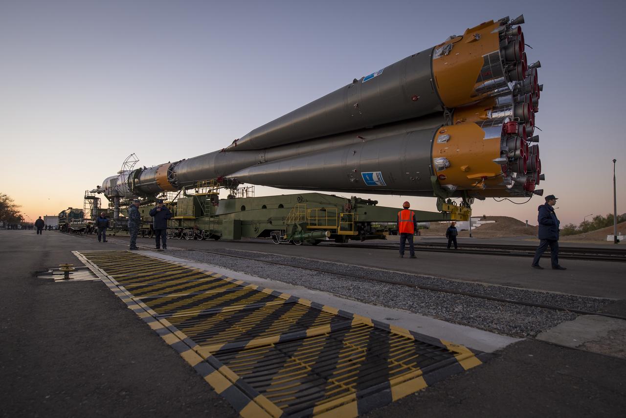 The Soyuz rocket is rolled out to the launch pad by train, on Sunday, October 21, 2012, at the Baikonur Cosmodrome in Kazakhstan.  Launch of the Soyuz rocket is scheduled for October 23 and will send Expedition 33/34 Flight Engineer Kevin Ford of NASA, Soyuz Commander Oleg Novitskiy and Flight Engineer Evgeny Tarelkin of ROSCOSMOS on a five-month mission aboard the International Space Station.  Photo Credit: (NASA/Bill Ingalls)