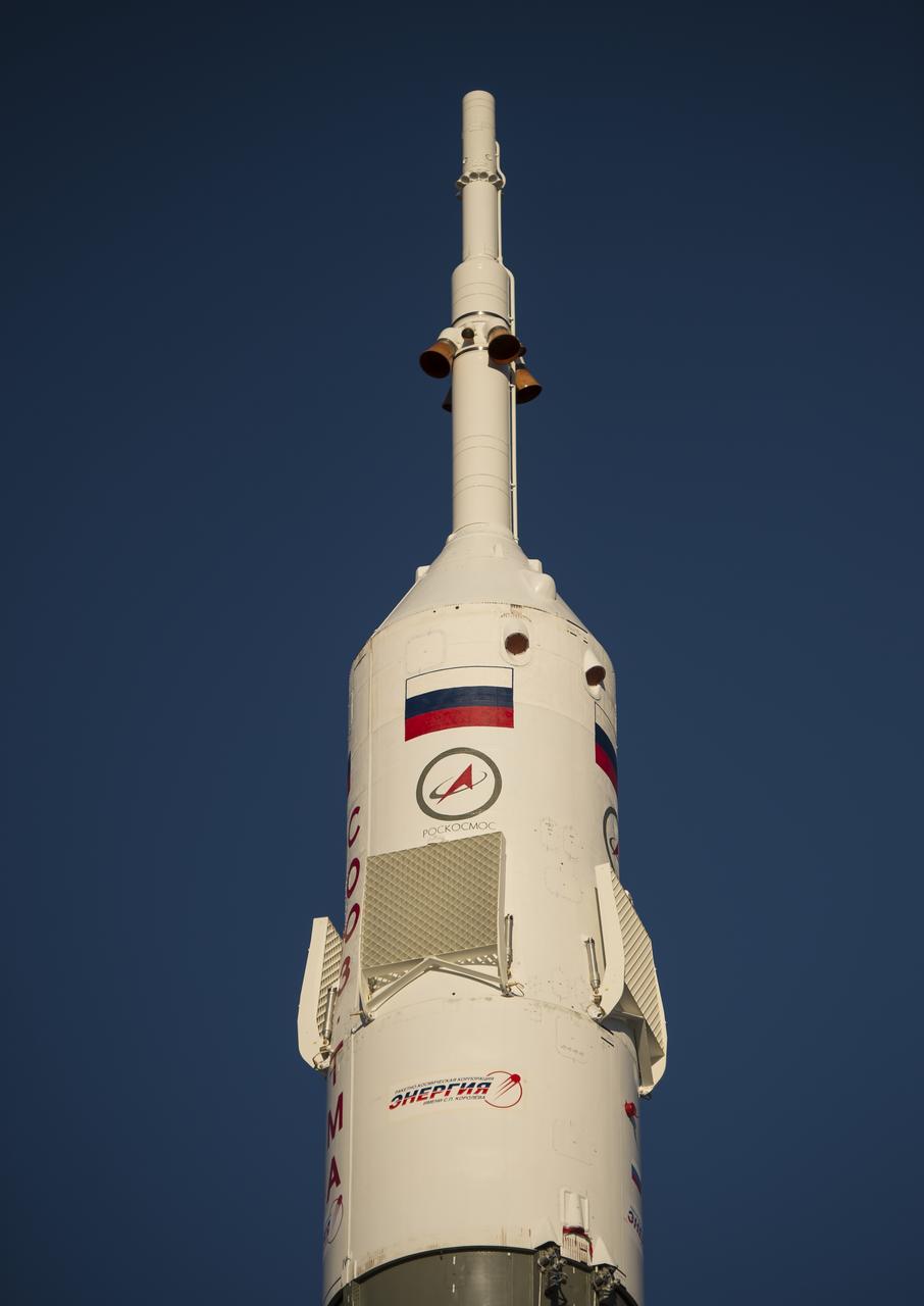 The Soyuz rocket is erected into position after being rolled out to the launch pad by train, on Sunday, October 21, 2012, at the Baikonur Cosmodrome in Kazakhstan.  Launch of the Soyuz rocket is scheduled for October 23 and will send Expedition 33/34 Flight Engineer Kevin Ford of NASA, Soyuz Commander Oleg Novitskiy and Flight Engineer Evgeny Tarelkin of ROSCOSMOS on a five-month mission aboard the International Space Station.  Photo Credit: (NASA/Bill Ingalls)