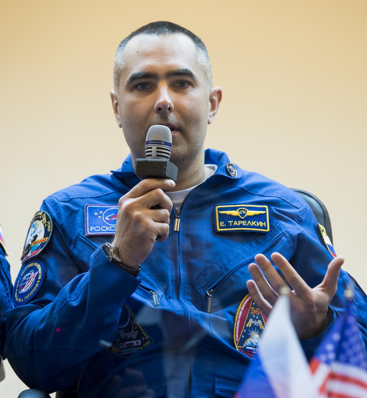 Expedition 33 Flight Engineer Evgeny Tarelkin answers a reporters question during a press conference held at the Cosmonaut Hotel, on Monday, October 22, 2012, in Baikonur, Kazakhstan. Launch of the Soyuz rocket is scheduled for October 23 and will send Expedition 33/34 Flight Engineer Kevin Ford of NASA, Soyuz Commander Oleg Novitskiy and Flight Engineer Evgeny Tarelkin of ROSCOSMOS on a five-month mission aboard the International Space Station. Photo Credit: (NASA/Bill Ingalls)