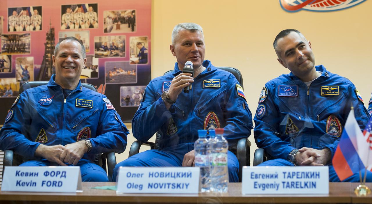 Expedition 33/34 Flight Engineer Kevin Ford of NASA, left, Soyuz Commander Oleg Novitskiy and Flight Engineer Evgeny Tarelkin of ROSCOSMOS, right, are seen during a press conference held at the Cosmonaut Hotel, on Monday, October 22, 2012, in Baikonur, Kazakhstan. Launch of the Soyuz rocket is scheduled for October 23 and will send Ford, Novitskiy and Tarelkin on a five-month mission aboard the International Space Station. Photo Credit: (NASA/Bill Ingalls)