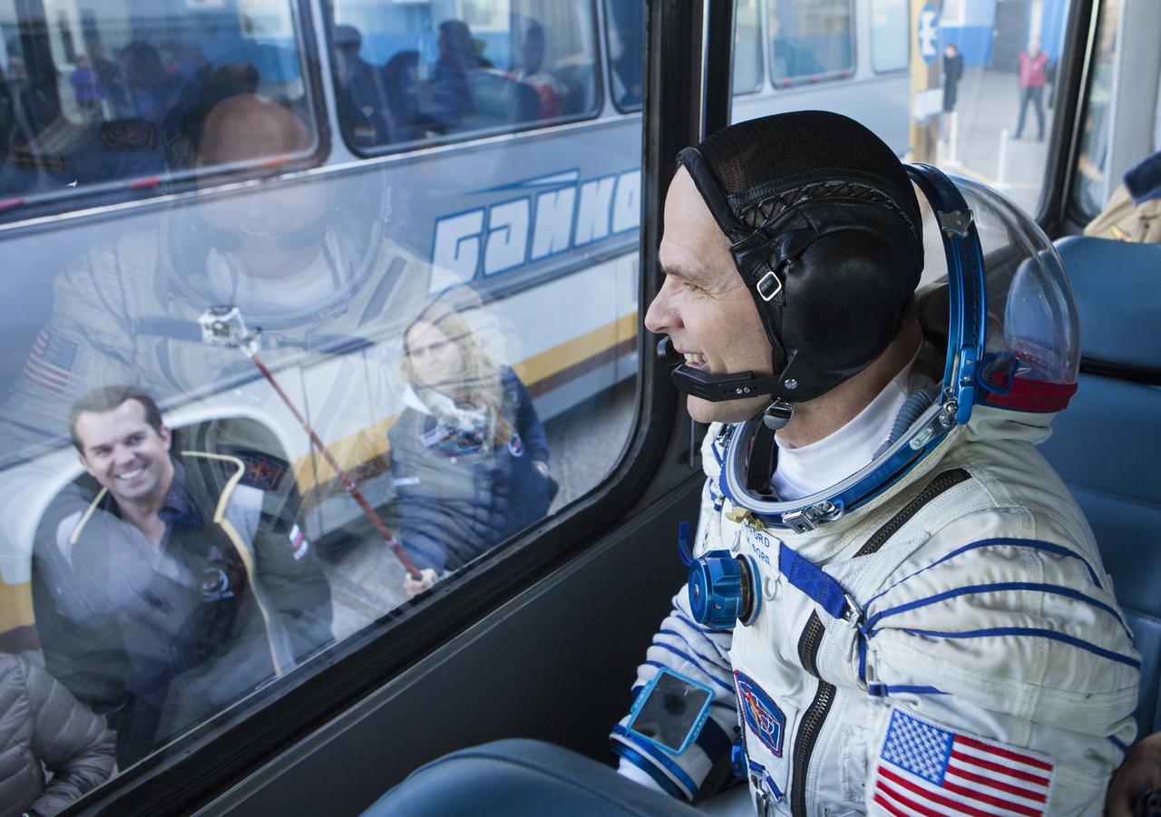 Expedition 33/34 crew member, NASA Astronaut and Flight Engineer Kevin Ford, looks out at family and friends as the bus with he and fellow crew mates, Russian Cosmonaut and Soyuz Commander Oleg Novitskiy, and Russian Cosmonaut and Flight Engineer Evgeny Tarelkin, head to launch site 31 for their launch onboard a Soyuz TMA-06M spacecraft to the International Space Station, Tuesday, October 23, 2012, in Baikonur, Kazakhstan. Launch of the Soyuz rocket will send Ford, Novitskiy and Tarelkin on a five-month mission aboard the International Space Station. Photo Credit: (NASA/GCTC/Andrey Shelepin)