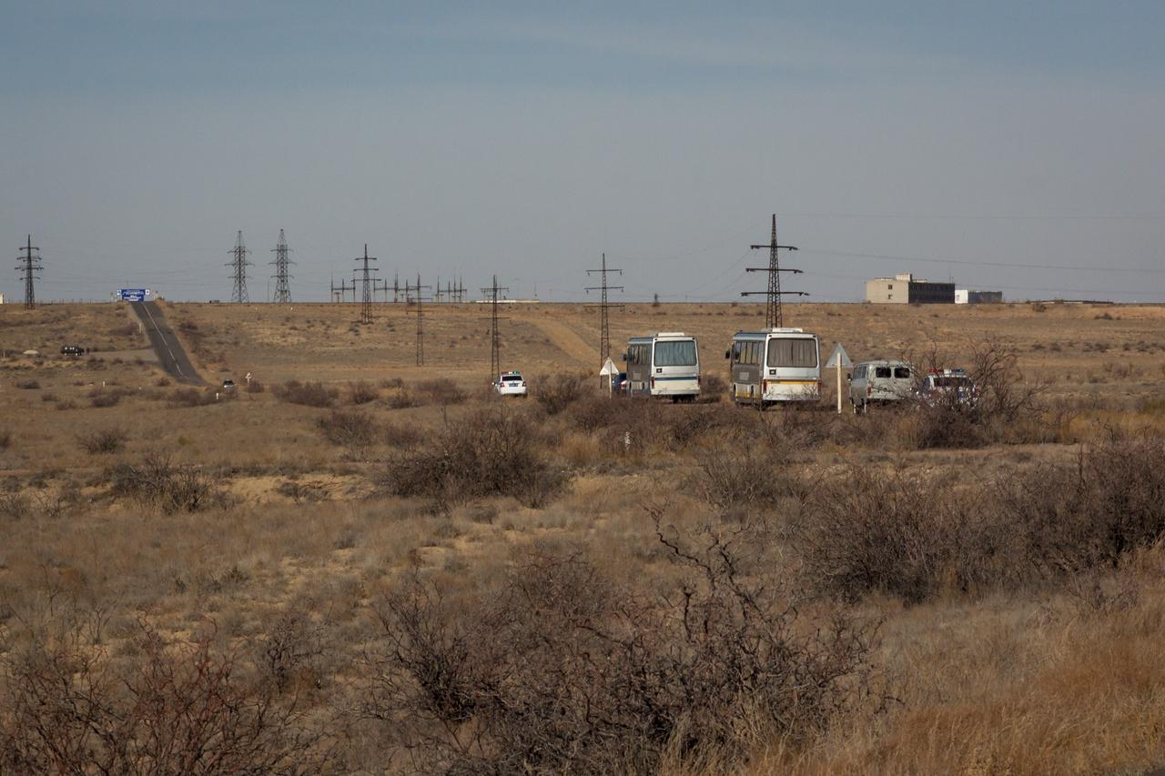 The bus convoy carrying Expedition 33/34 crew members, Russian Cosmonaut and Soyuz Commander Oleg Novitskiy, NASA Astronaut and Flight Engineer Kevin Ford, and Russian Cosmonaut and Flight Engineer Evgeny Tarelkin, heads to launch site 31 for the crews launch onboard a Soyuz TMA-06M spacecraft to the International Space Station, Tuesday, October 23, 2012, in Baikonur, Kazakhstan. Launch of the Soyuz rocket will send Ford, Novitskiy and Tarelkin on a five-month mission aboard the International Space Station. Photo Credit: (NASA/Victor Zelentsov)