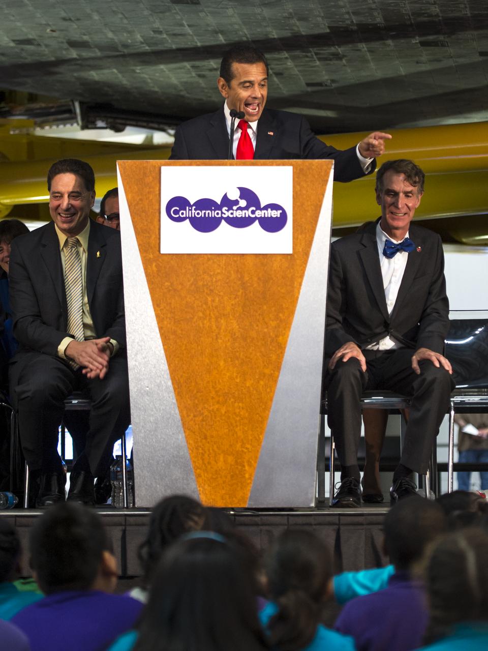 Mayor of Los Angeles Antonio Villaraigosa addresses a class of fourth graders during the grand opening ceremony for the California Science center's Samuel Oschin Space Shuttle Endeavour Display Pavilion, Tuesday, Oct. 30, 2012, in Los Angeles.  Endeavour, built as a replacement for space shuttle Challenger, completed 25 missions, spent 299 days in orbit, and orbited Earth 4,671 times while traveling 122,883,151 miles. Photo Credit: (NASA/Bill Ingalls)