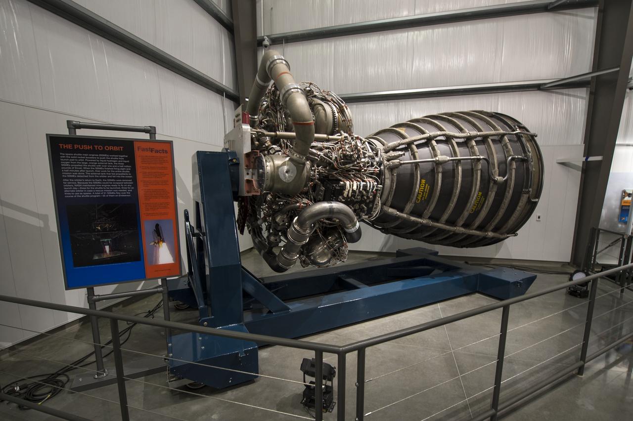 A space shuttle main engine (SSME) is on display near the space shuttle Endeavour at the California Science center's Samuel Oschin Space Shuttle Endeavour Display Pavilion, Tuesday, Oct. 30, 2012, in Los Angeles. Endeavour, built as a replacement for space shuttle Challenger, completed 25 missions, spent 299 days in orbit, and orbited Earth 4,671 times while traveling 122,883,151 miles. Photo Credit: (NASA/Bill Ingalls)