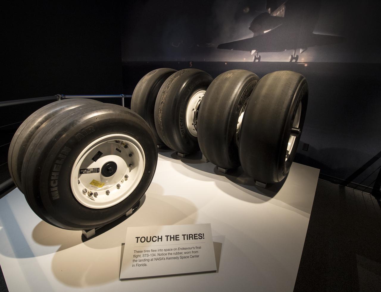 Tires from space shuttle Endeavour's final flight are on display at the California Science Center's, California Experience gallery, Tuesday, Oct. 30, 2012, in Los Angeles. The grand opening ceremony for the California Science center's Samuel Oschin Space Shuttle Endeavour Display Pavilion took place on Tuesday, Oct. 30, 2012. Endeavour, built as a replacement for space shuttle Challenger, completed 25 missions, spent 299 days in orbit, and orbited Earth 4,671 times while traveling 122,883,151 miles. Photo Credit: (NASA/Bill Ingalls)