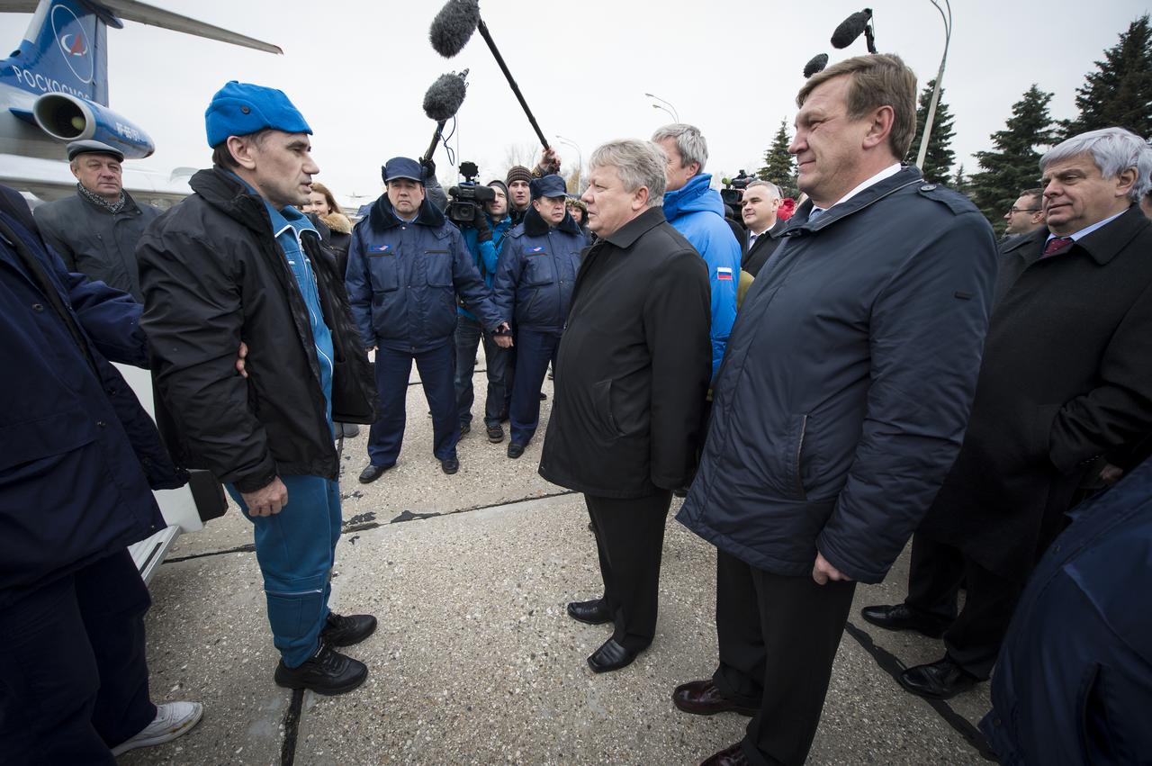 Expedition 33 flight engineer Yuri Malenchenko, left, is welcomed home upon his arrival in Star City, Monday, Nov. 19, 2012 in Russia. Malenchenko, Expedition 33 Commander Sunita Williams and JAXA flight engineer Akihiko Hoshide landed in their Soyuz TMA-05M earlier that day in a remote area outside of Arkalyk, Kazakhstan. They returned home from four months onboard the International Space Station where they served as members of the Expedition 32 and 33 crews. Photo Credit: (NASA/Bill Ingalls)