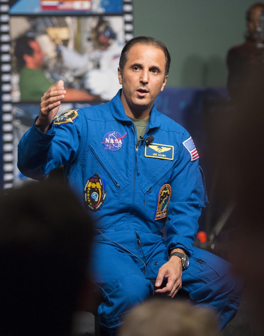 NASA astronaut Joe Acaba answers questions at a behind-the-scenes NASA Social at NASA Headquarters on Tuesday, Dec. 4, 2012 in Washington. Acaba launched to the International Space Station on a Russian Soyuz spacecraft May 15, 2012, spending 123 days aboard as a flight engineer of the Expedition 31 and 32 crews. He recently returned to Earth on Sept. 17 after four months in low earth orbit. Photo Credit: (NASA/Carla Cioffi)