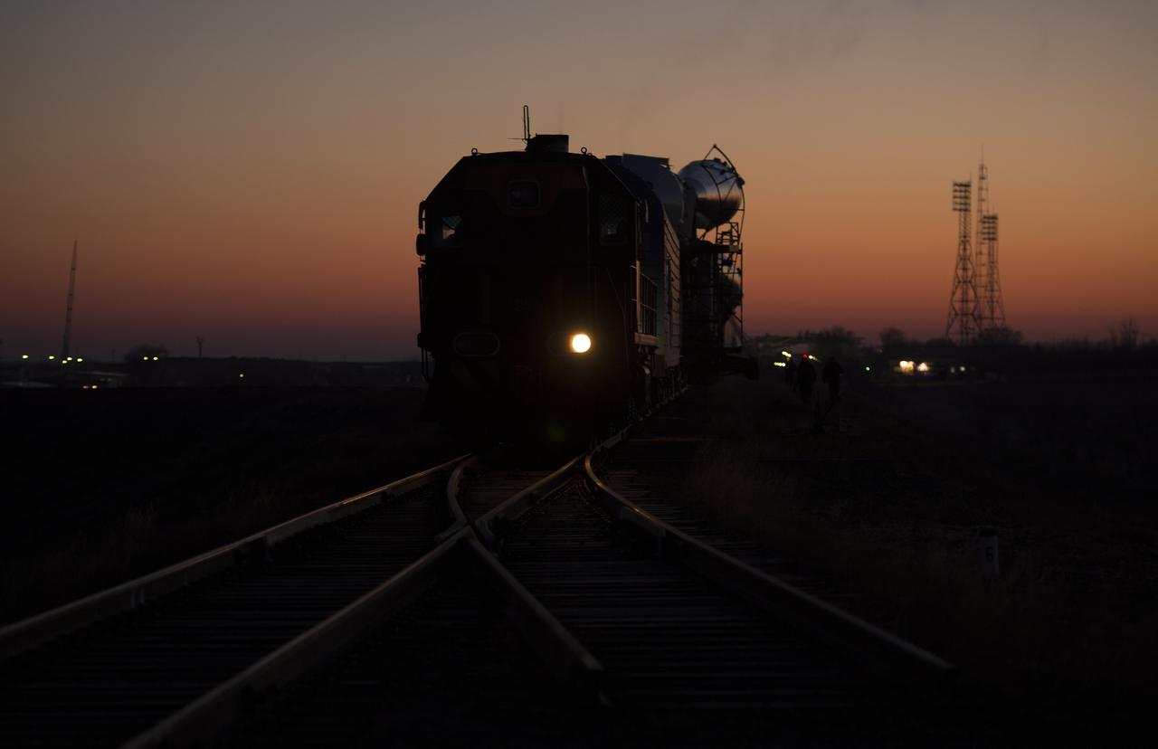 The Soyuz rocket is rolled out to the launch pad by train on Monday, December 17, 2012, at the Baikonur Cosmodrome in Kazakhstan.  Launch of the Soyuz rocket is scheduled for December 19 and will send Expedition 34/35 Flight Engineer Tom Marshburn of NASA, Soyuz Commander Roman Romanenko and Expedition 35 Commander Chris Hadfield of the Canadian Space Agency (CSA) on a five-month mission aboard the International Space Station.  Photo Credit: (NASA/Carla Cioffi)