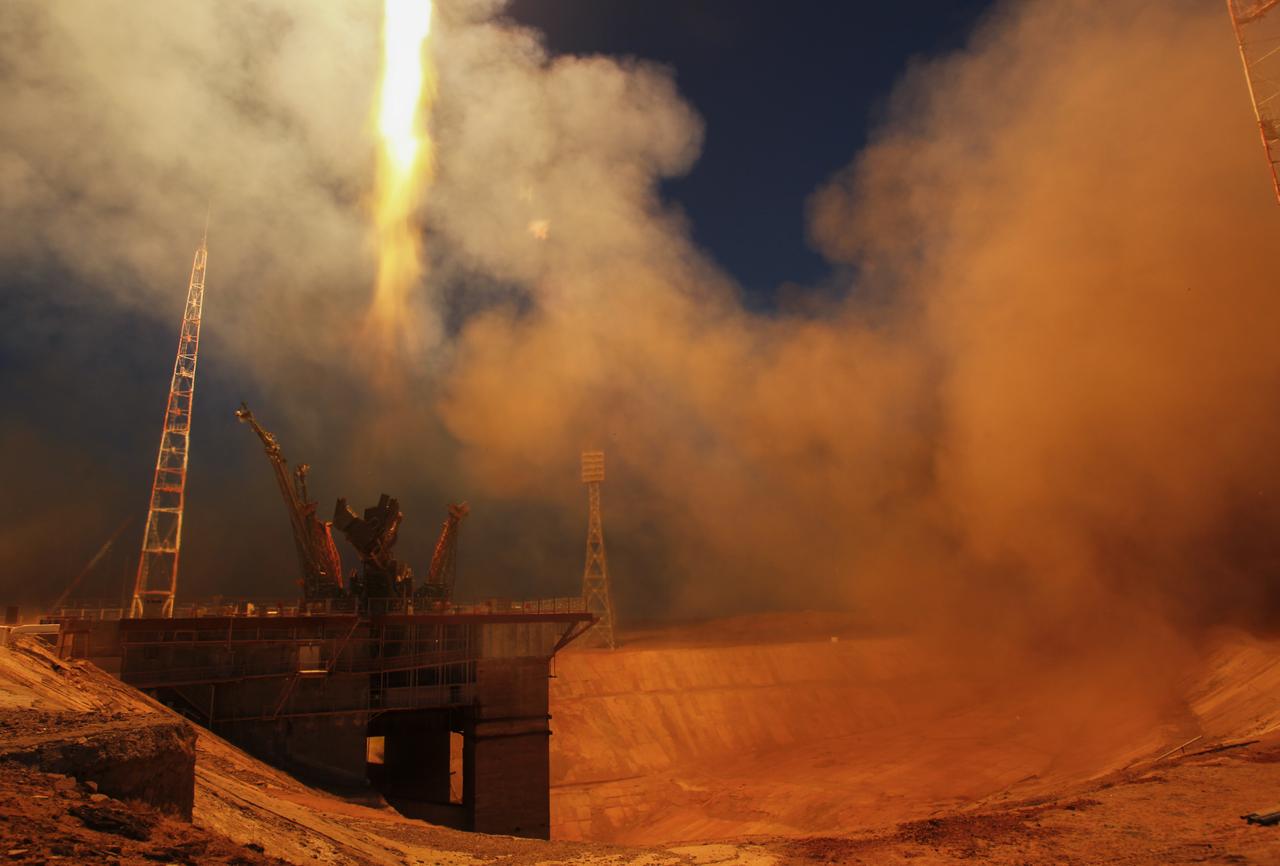 The Soyuz TMA-07M rocket launches from the Baikonur Cosmodrome in Kazakhstan on Wednesday, Dec. 19, 2012 carrying Expedition 34 NASA Flight Engineers Tom Marshburn, Soyuz Commander Roman Romanenko and Flight Engineer Chris Hadfield of the Canadian Space Agency (CSA) to the International Space Station.  Their Soyuz TMA-07M rocket launched at 6:12 p.m. local time.  Photo Credit: (NASA/Carla Cioffi)