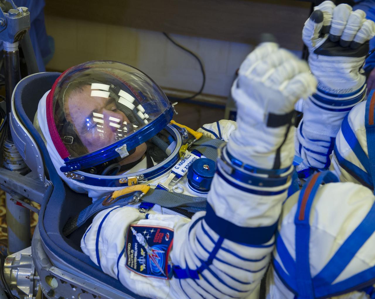 Expedition 34/35 Flight Engineer Chris Hadfield has his Russian Sokol suit pressure checked ahead of his launch onboard a Soyuz TMA-07M spacecraft to the International Space Station with fellow cremates, Flight Engineer Tom Marshburn and Soyuz Commander Roman Romanenko, on Wednesday, Dec. 19, 2012, in Baikonur, Kazakhstan. Launch of the Soyuz rocket will send Hadfield, Romanenko and Marshburn on a five-month mission aboard the International Space Station.  Photo Credit: (NASA/GCTC/Andrey Shelepin)