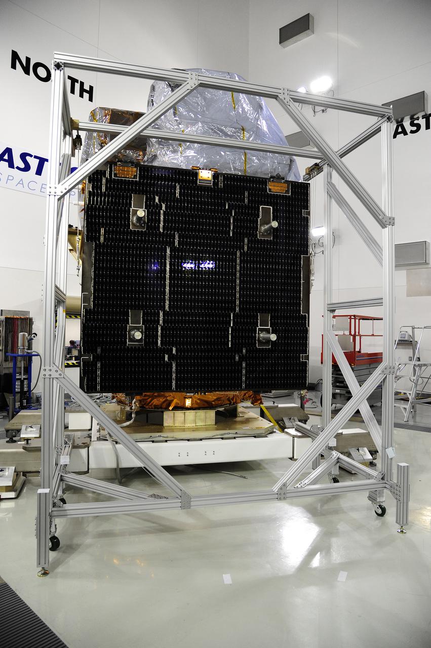 VANDENBERG AFB, Calif. -- In the Astrotech processing facility at Vandenberg Air Force Base, Calif., solar arrays for NASA's Landsat Data Continuity Mission, or LDCM, satellite are being attached and tested. The Landsat Data Continuity Mission LDCM is the future of Landsat satellites. It will continue to obtain valuable data and imagery to be used in agriculture, education, business, science, and government. The Landsat Program provides repetitive acquisition of high resolution multispectral data of the Earth's surface on a global basis. The data from the Landsat spacecraft constitute the longest record of the Earth's continental surfaces as seen from space. It is a record unmatched in quality, detail, coverage, and value. Liftoff is planned for Feb. 11, 2013 aboard a United Launch Alliance Atlas V rocket. For more information, visit: http:__www.nasa.gov_mission_pages_landsat_main_index.html Photo credit: NASA