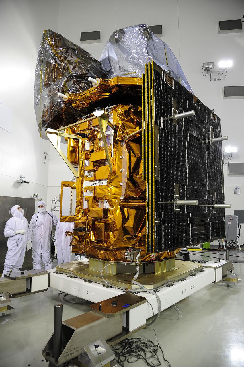 VANDENBERG AFB, Calif. -- At the Astrotech processing facility at Vandenberg Air Force Base, Calif., technicians perform close-outs on NASA's Landsat Data Continuity Mission, or LDCM, satellite.   The Landsat Data Continuity Mission LDCM is the future of Landsat satellites. It will continue to obtain valuable data and imagery to be used in agriculture, education, business, science, and government. The Landsat Program provides repetitive acquisition of high resolution multispectral data of the Earth's surface on a global basis. The data from the Landsat spacecraft constitute the longest record of the Earth's continental surfaces as seen from space. It is a record unmatched in quality, detail, coverage, and value. Liftoff is planned for Feb. 11, 2013 aboard a United Launch Alliance Atlas V rocket. For more information, visit: http:__www.nasa.gov_mission_pages_landsat_main_index.html Photo credit: NASA