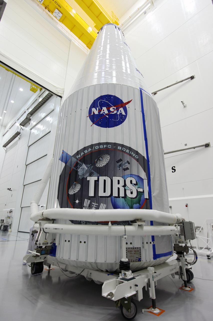 TITUSVILLE, Fla. - Inside the Astrotech payload processing facility in Titusville, Fla. near NASA’s Kennedy Space Center, the Tracking and Data Relay Satellite, TDRS-K, has been encapsulated in its payload fairing. The spacecraft will now be transported to Space Launch Complex 41 at Cape Canaveral Air Force Station. Liftoff for the TDRS-K is planned for January 30, 2013. The TDRS-K spacecraft is part of the next-generation series in the Tracking and Data Relay Satellite System, a constellation of space-based communication satellites providing tracking, telemetry, command and high-bandwidth data return services. For more information, visit http:__www.nasa.gov_mission_pages_tdrs_index.html Photo credit: NASA_Kim Shiflett