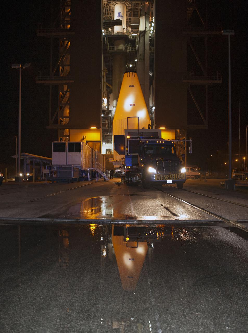 CAPE CANAVERAL, Fla. –- Enclosed in its payload fairing, NASA's Tracking and Data Relay Satellite, TDRS-K, , arrives at Cape Canaveral Air Force Station's Space Launch Complex 41. The spacecraft will now be lifted into position atop a United Launch Alliance Atlas V rocket. Liftoff for the TDRS-K is planned for January 30, 2013. The TDRS-K spacecraft is part of the next-generation series in the Tracking and Data Relay Satellite System, a constellation of space-based communication satellites providing tracking, telemetry, command and high-bandwidth data return services. For more information, visit http:__www.nasa.gov_mission_pages_tdrs_index.html Photo credit: NASA_ Glenn Bension