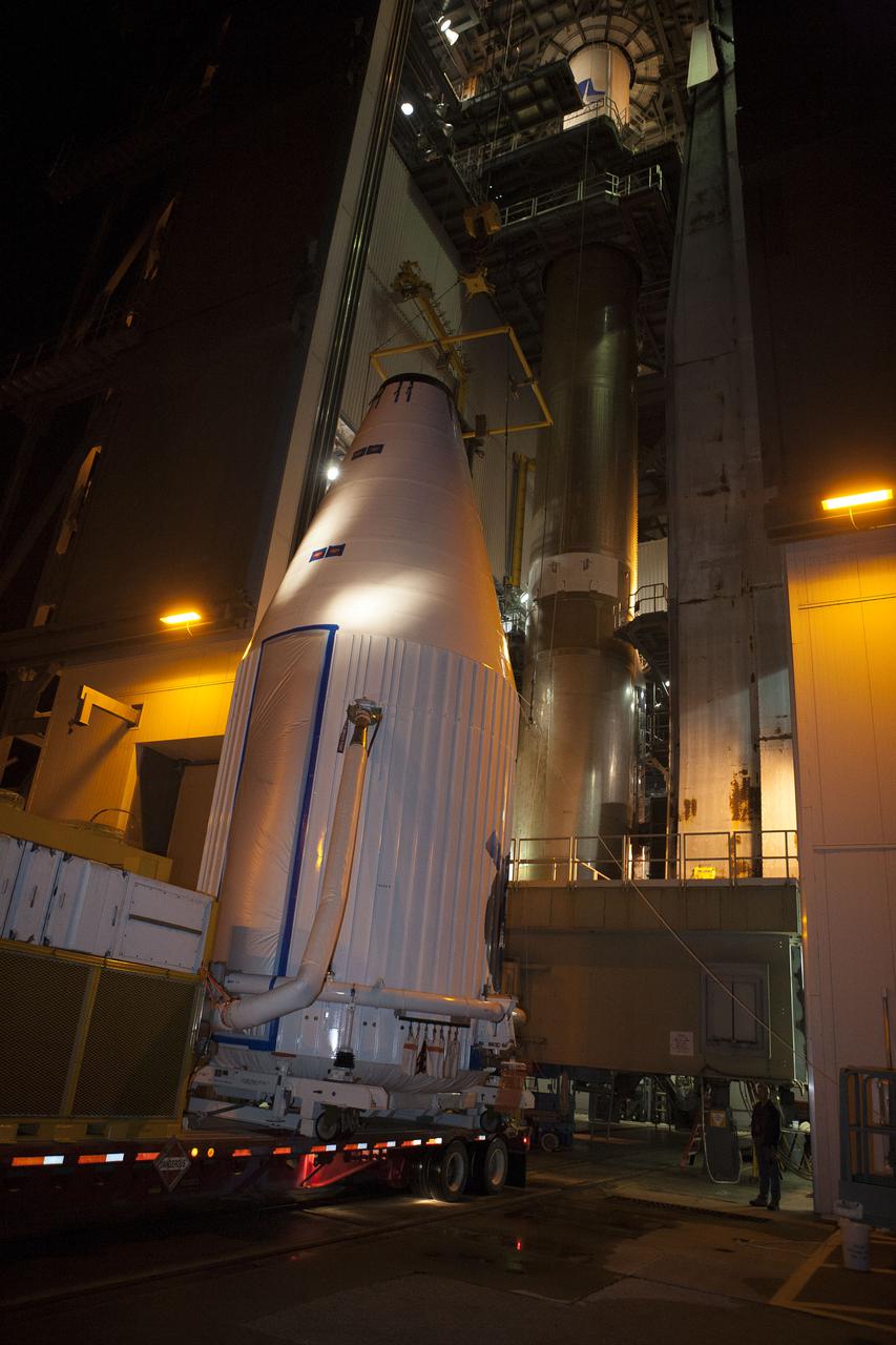 CAPE CANAVERAL, Fla. –- Enclosed in its payload fairing, NASA's Tracking and Data Relay Satellite, TDRS-K, , arrives at Cape Canaveral Air Force Station's Space Launch Complex 41. The spacecraft will now be lifted into position atop a United Launch Alliance Atlas V rocket. Liftoff for the TDRS-K is planned for January 30, 2013. The TDRS-K spacecraft is part of the next-generation series in the Tracking and Data Relay Satellite System, a constellation of space-based communication satellites providing tracking, telemetry, command and high-bandwidth data return services. For more information, visit http:__www.nasa.gov_mission_pages_tdrs_index.html Photo credit: NASA_ Glenn Bension