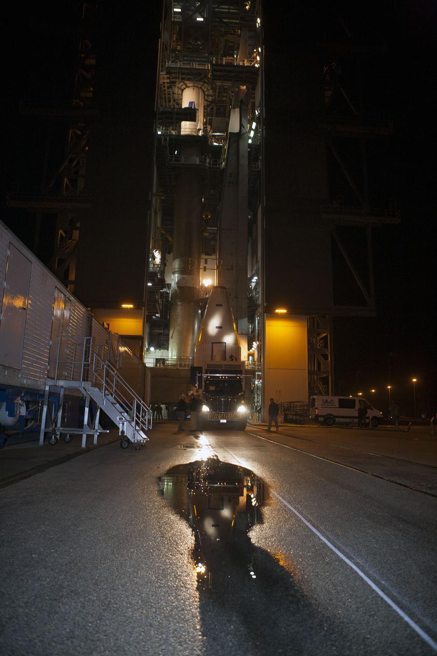 CAPE CANAVERAL, Fla. –- Enclosed in its payload fairing, NASA's Tracking and Data Relay Satellite, TDRS-K, , arrives at Cape Canaveral Air Force Station's Space Launch Complex 41. The spacecraft will now be lifted into position atop a United Launch Alliance Atlas V rocket. Liftoff for the TDRS-K is planned for January 30, 2013. The TDRS-K spacecraft is part of the next-generation series in the Tracking and Data Relay Satellite System, a constellation of space-based communication satellites providing tracking, telemetry, command and high-bandwidth data return services. For more information, visit http:__www.nasa.gov_mission_pages_tdrs_index.html Photo credit: NASA_ Glenn Bension